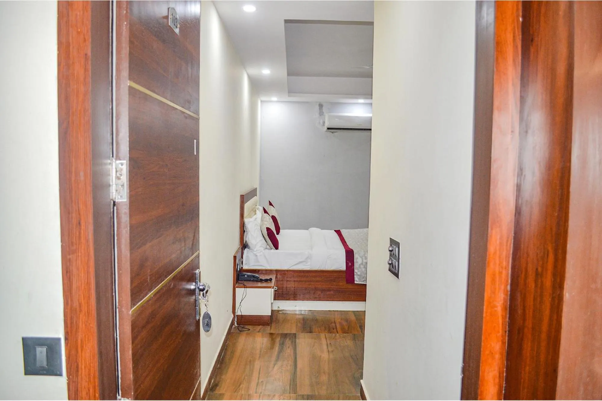 Bed in FabHotel The Golf Inn