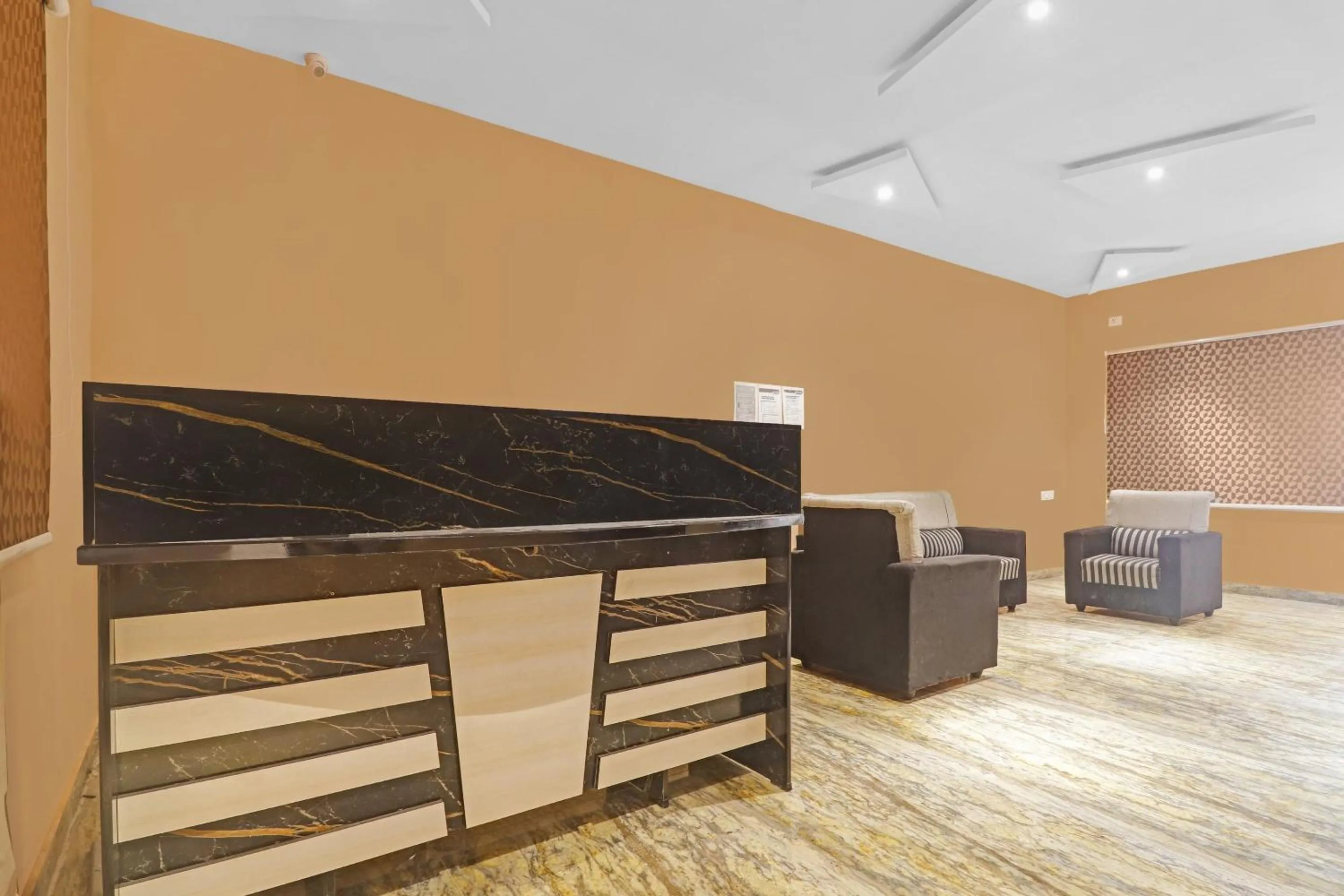 Lobby or reception in Capital O Sai Balaji Near Golconda Fort