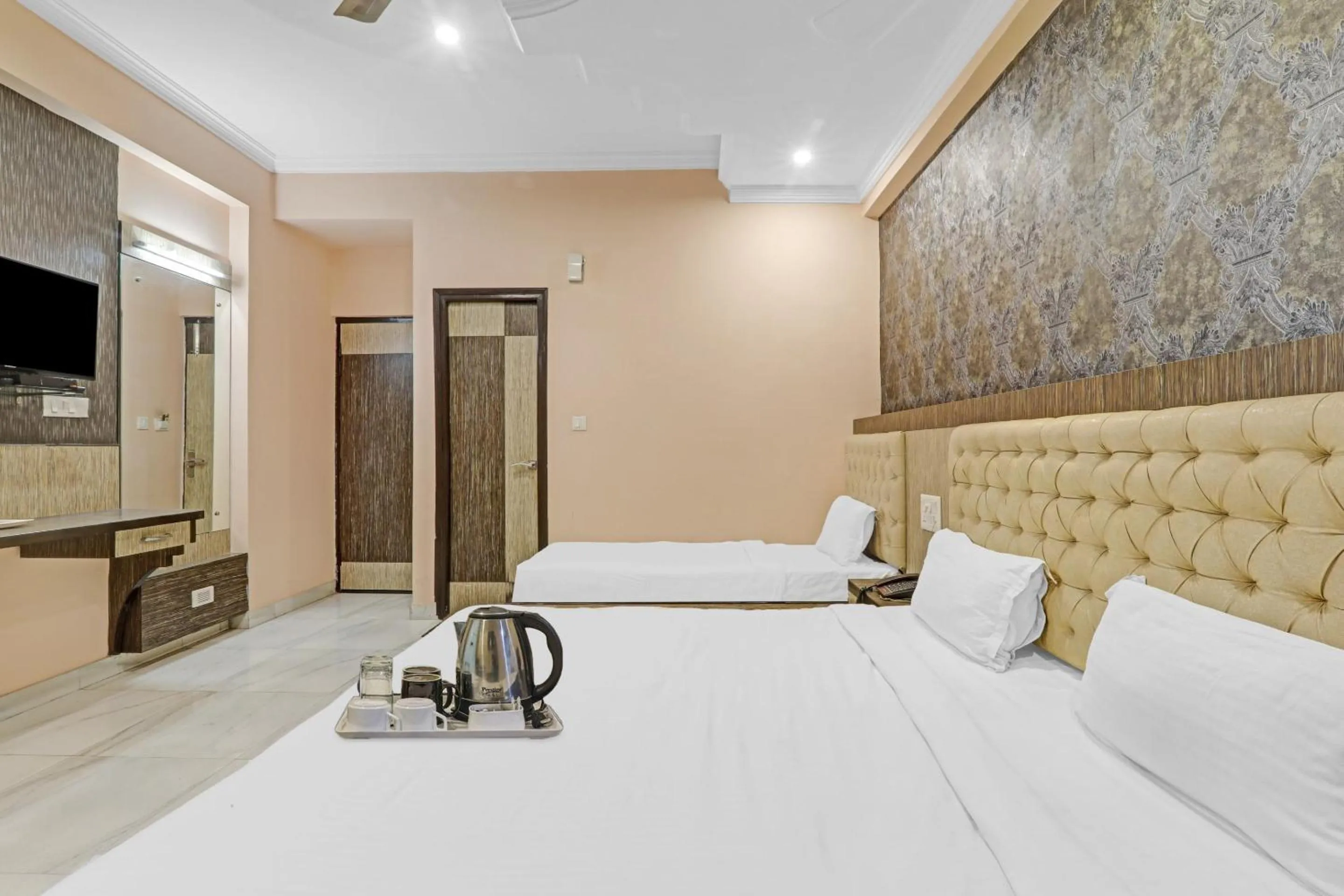 Bedroom, Bed in Capital O Townhouse Govinda Royal