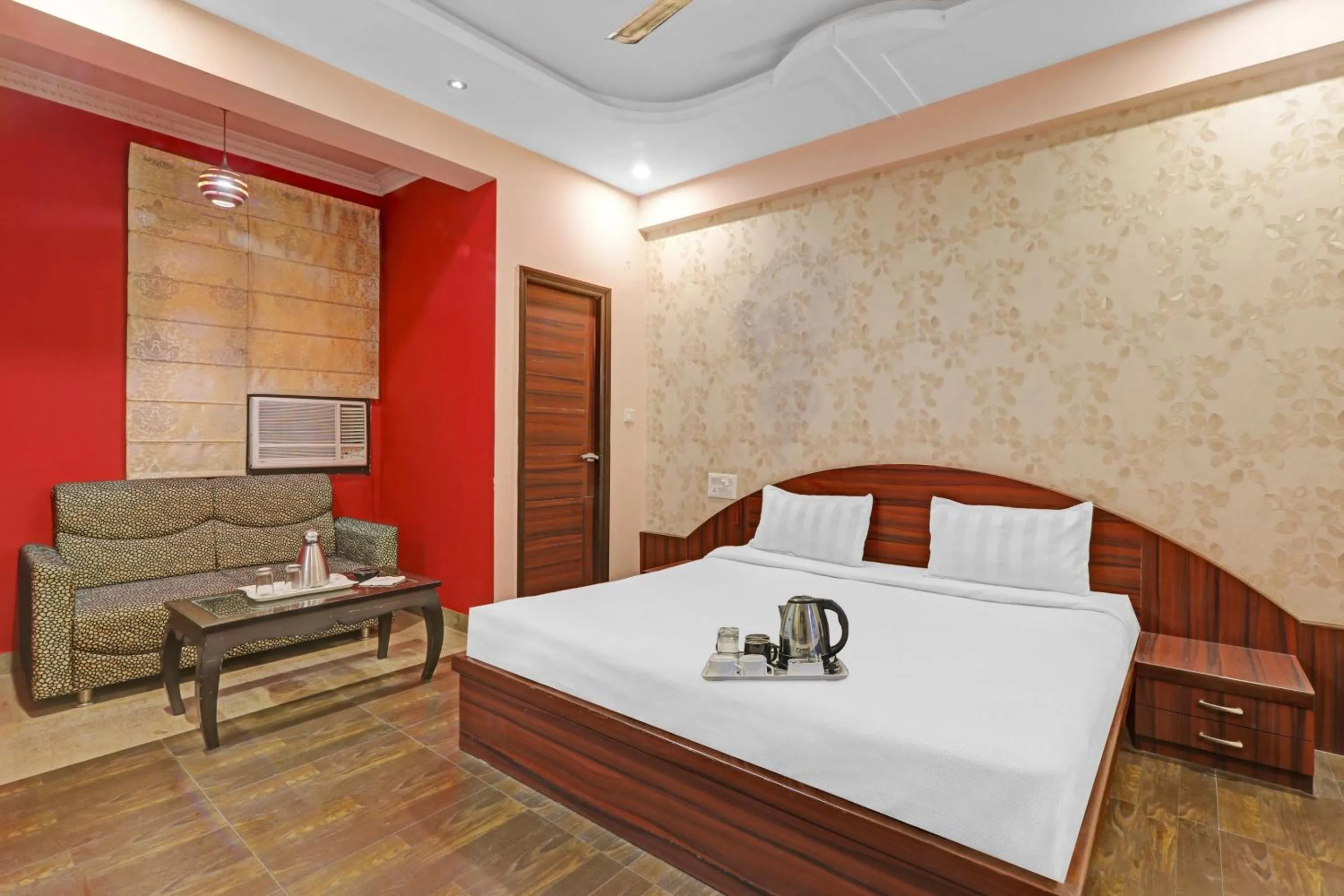 Bedroom, Bed in Capital O Townhouse Govinda Royal