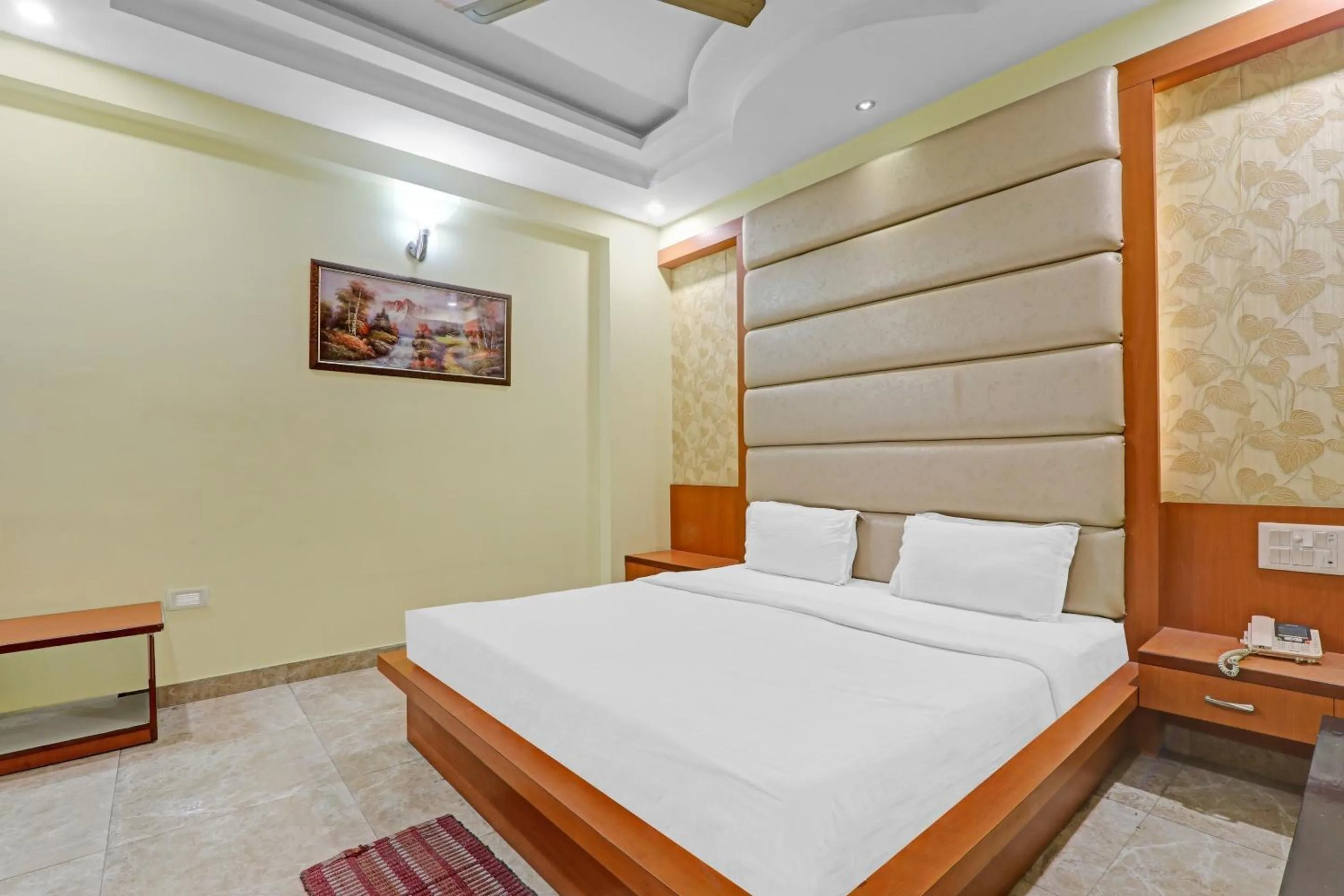 Bedroom, Bed in Capital O Townhouse Govinda Royal