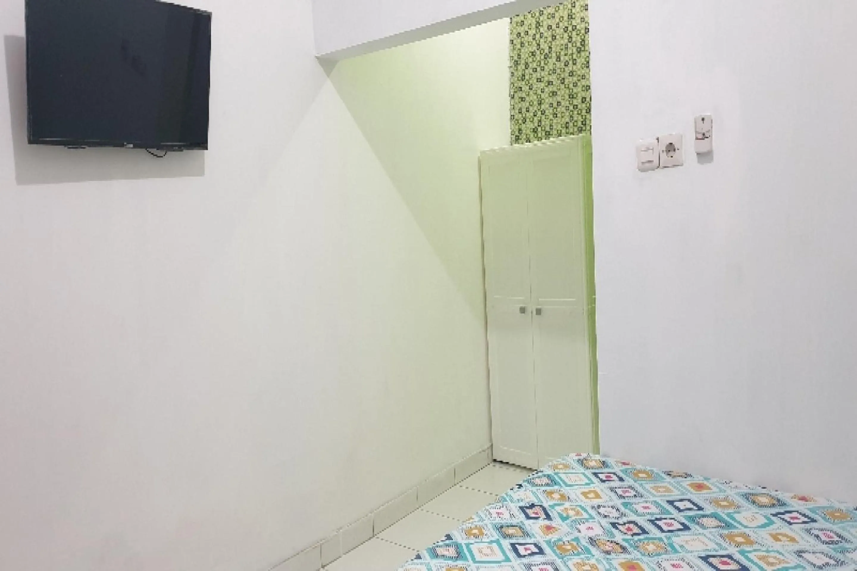 Bedroom in OYO 90990 Surya Residence