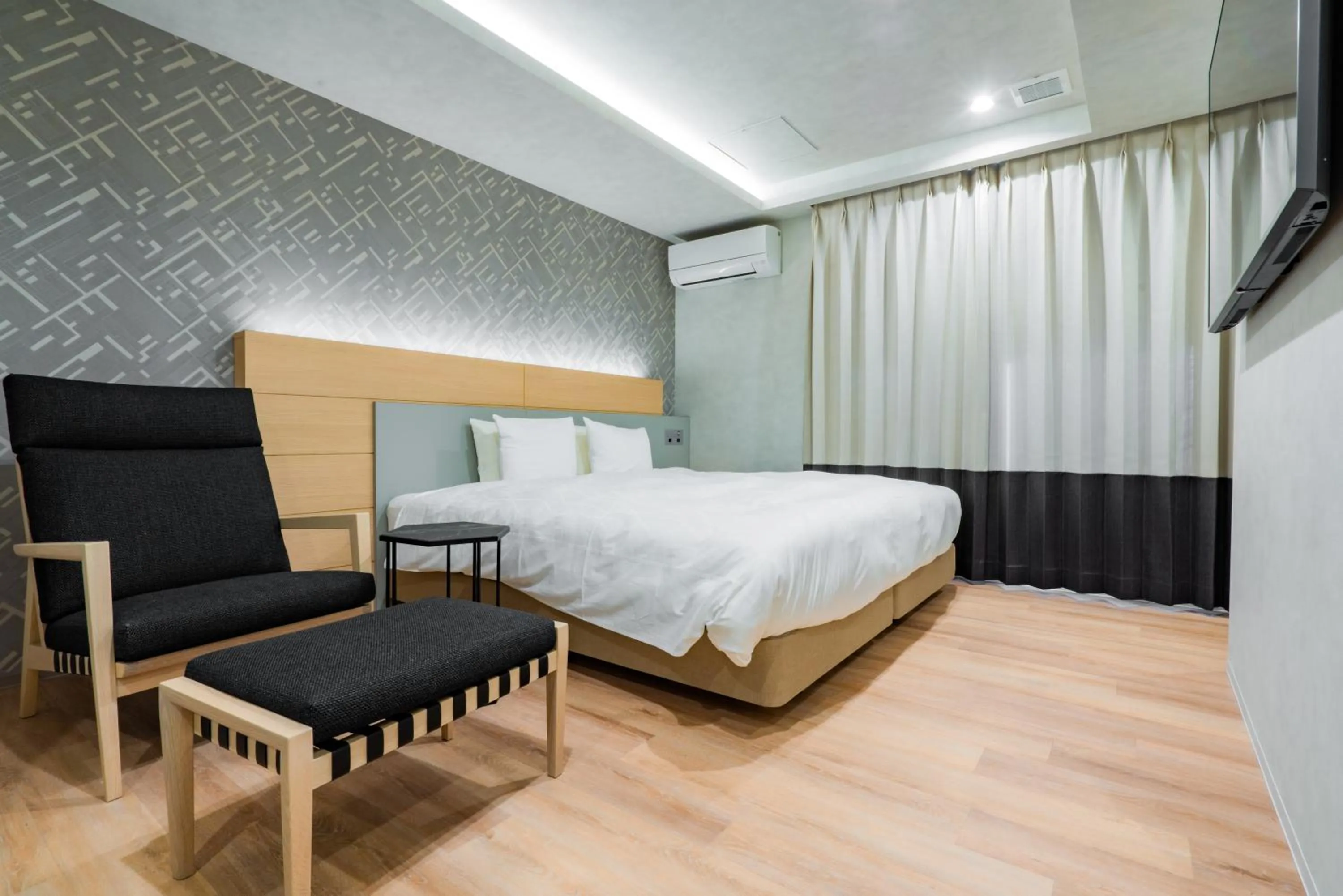 Bed in Randor Hotel Hiroshima Prestige