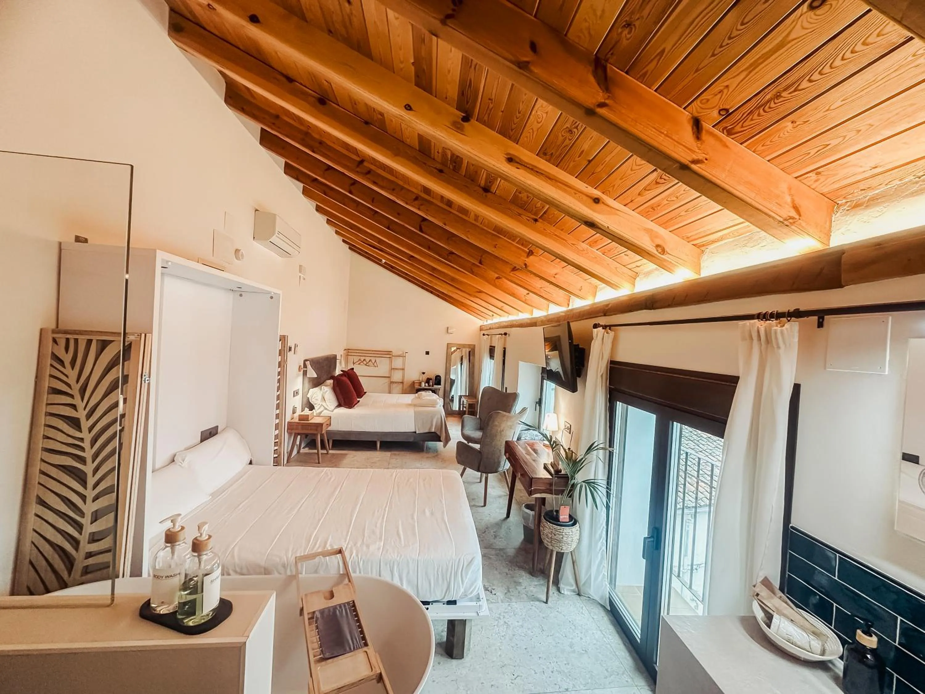 Bed in Hotel Boutique Poeta Jorge Manrique