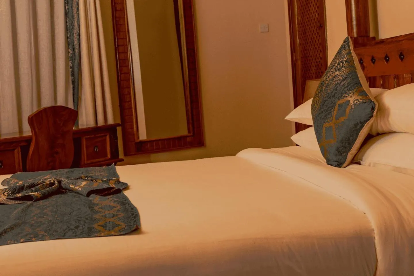 Bed in Divine Resort & Spa