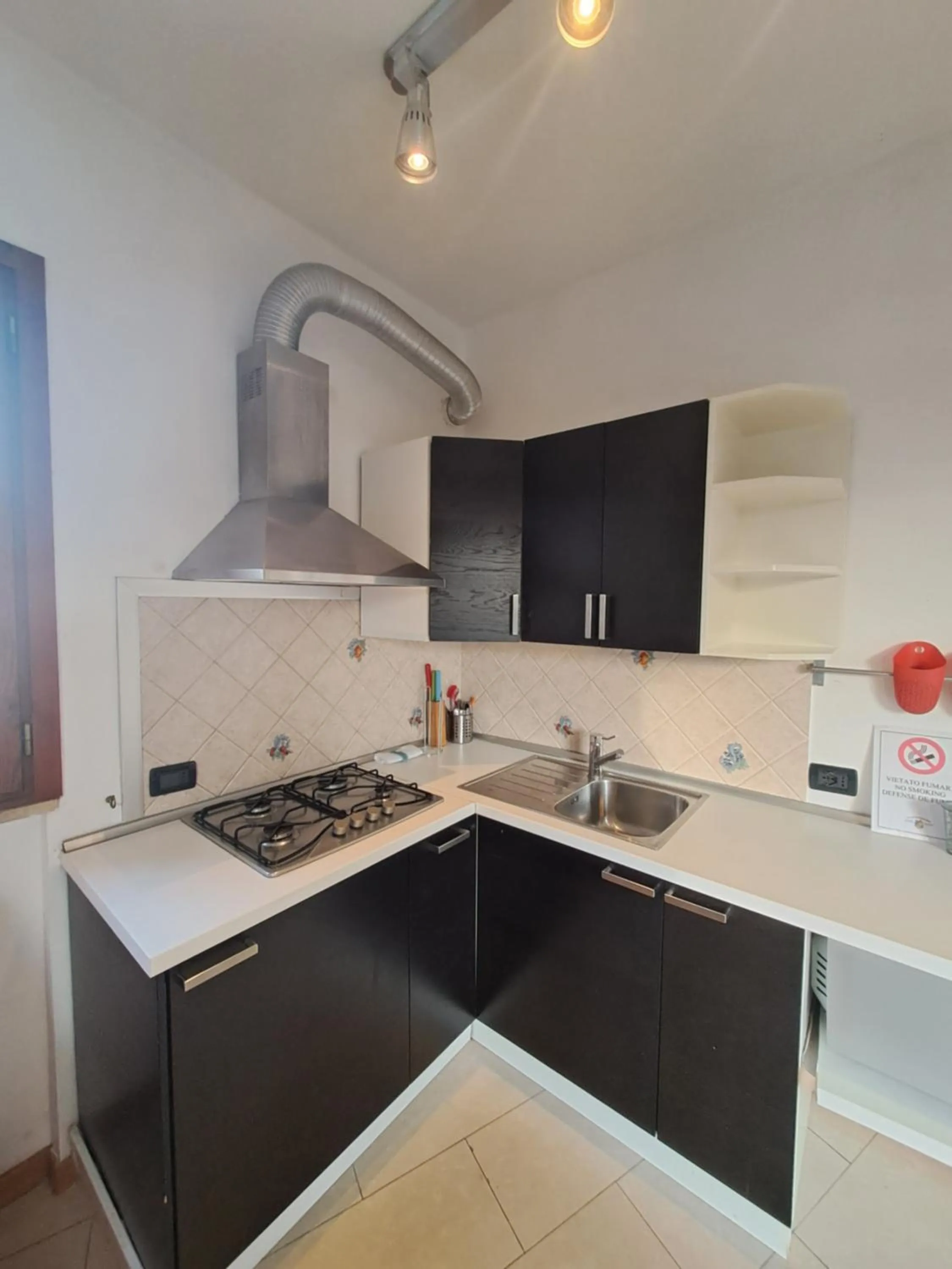 Kitchen or kitchenette in Flatinrome Residence Fiera