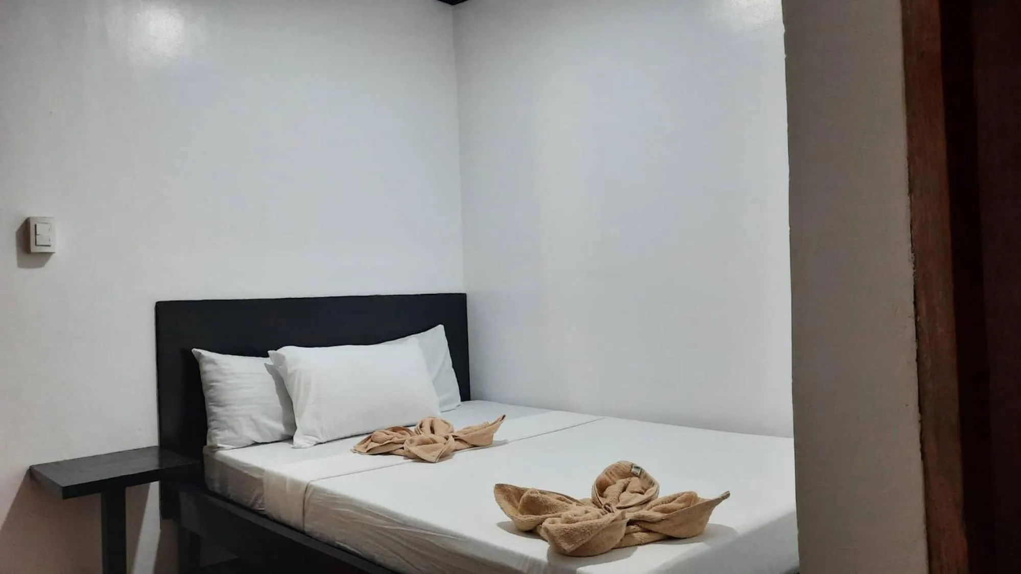 Bed in Lolo Panding Inn