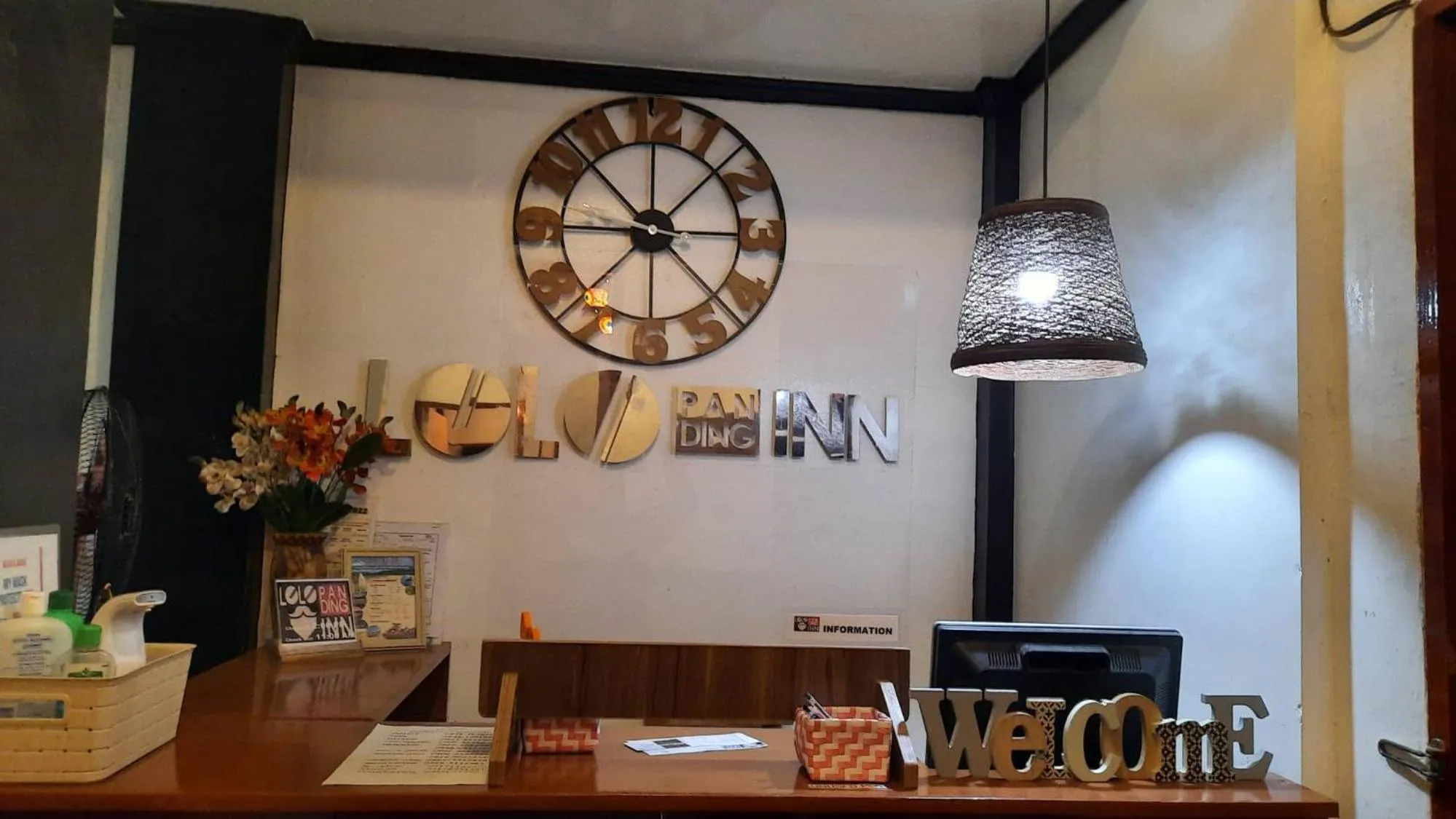 Property logo or sign in Lolo Panding Inn