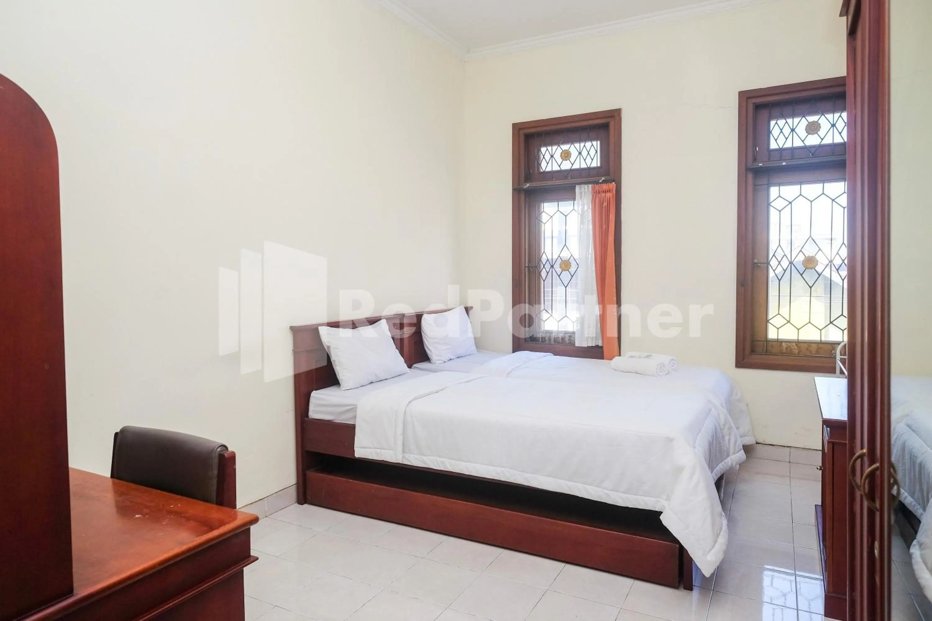 Bed in Griya Fatima Mitra RedDoorz near UGM