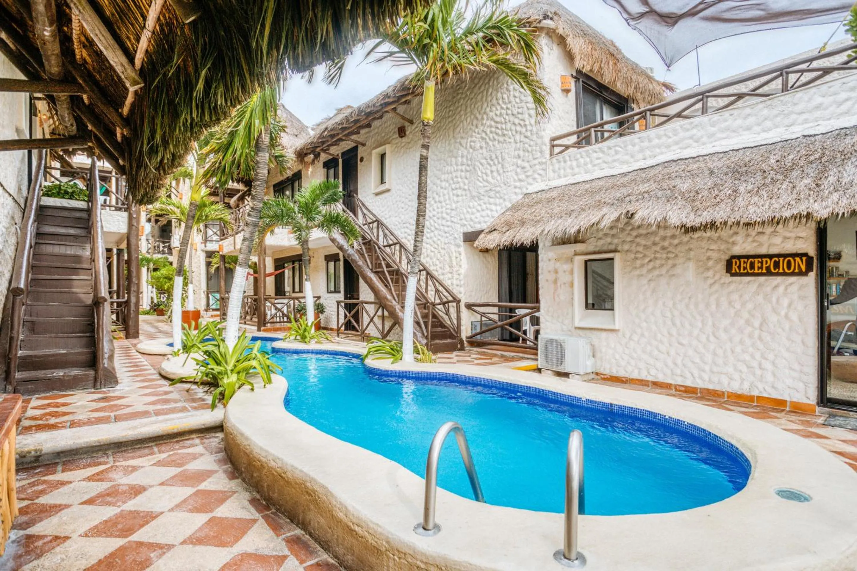 Swimming pool in Capital O Mimi Del Mar, Playa del Carmen