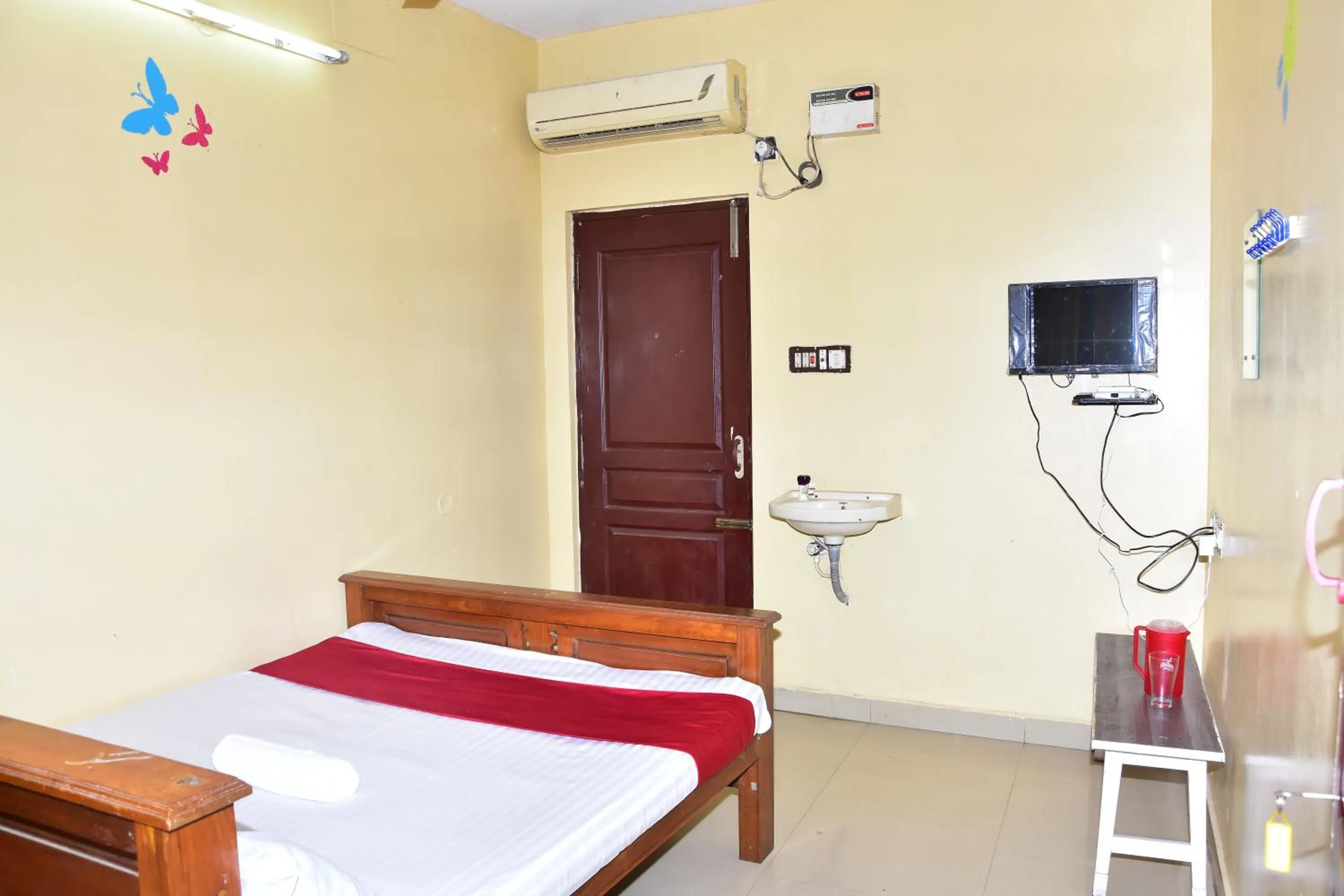 Bed in Sri Krishna Guest House