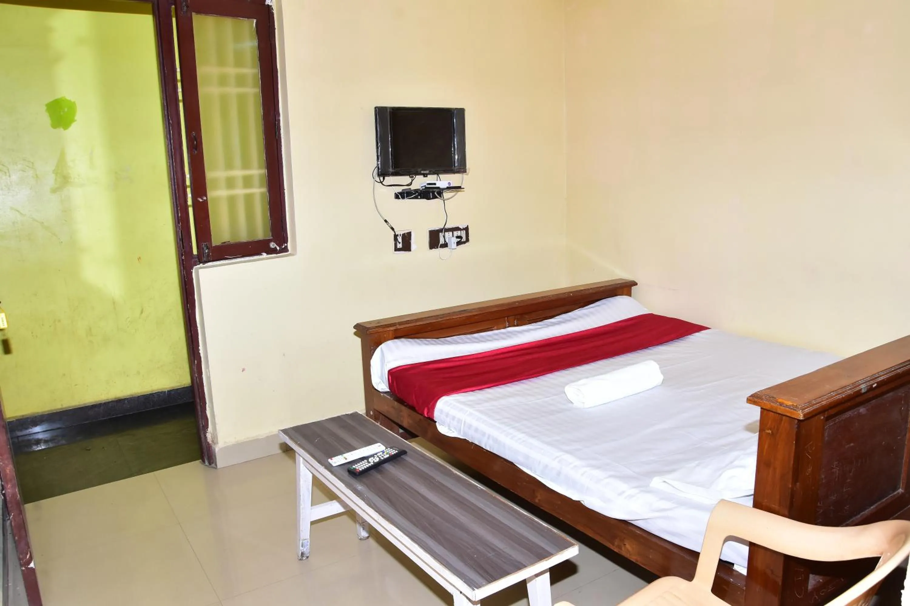 Bed in Sri Krishna Guest House