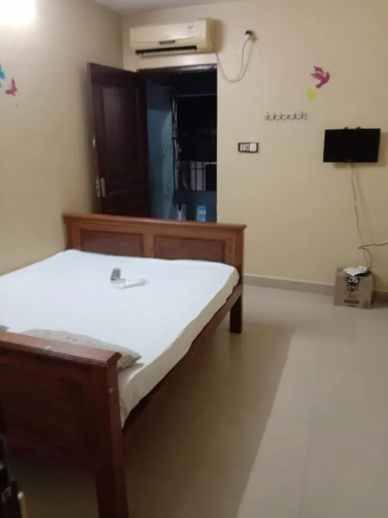 Bed in Sri Krishna Guest House