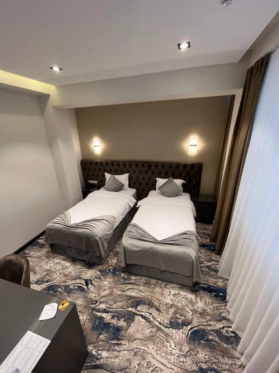 Photo of the whole room, Bed in UNIQUE HOTEL