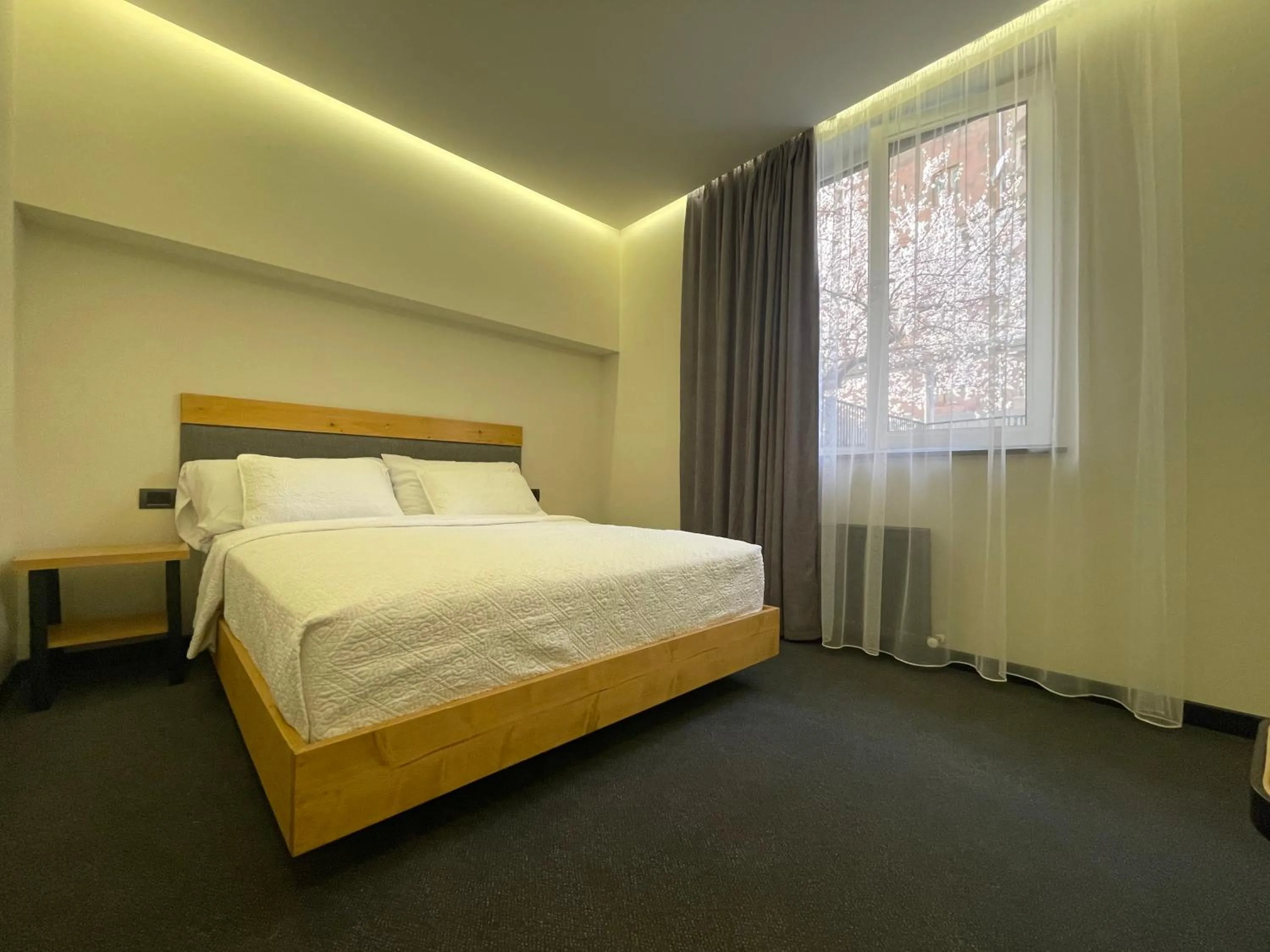Bed in MIST Boutique Hotel