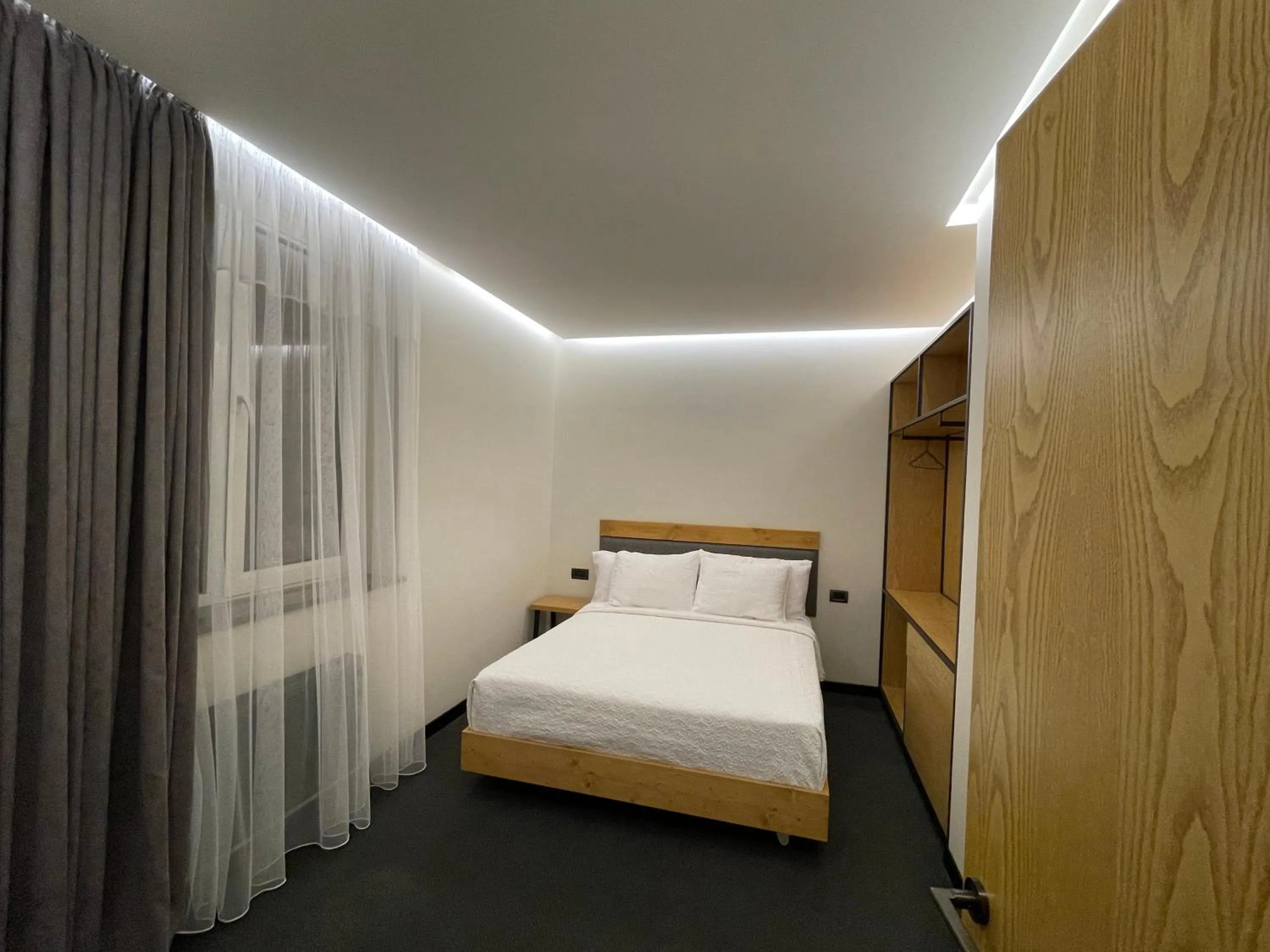 Bed in MIST Boutique Hotel