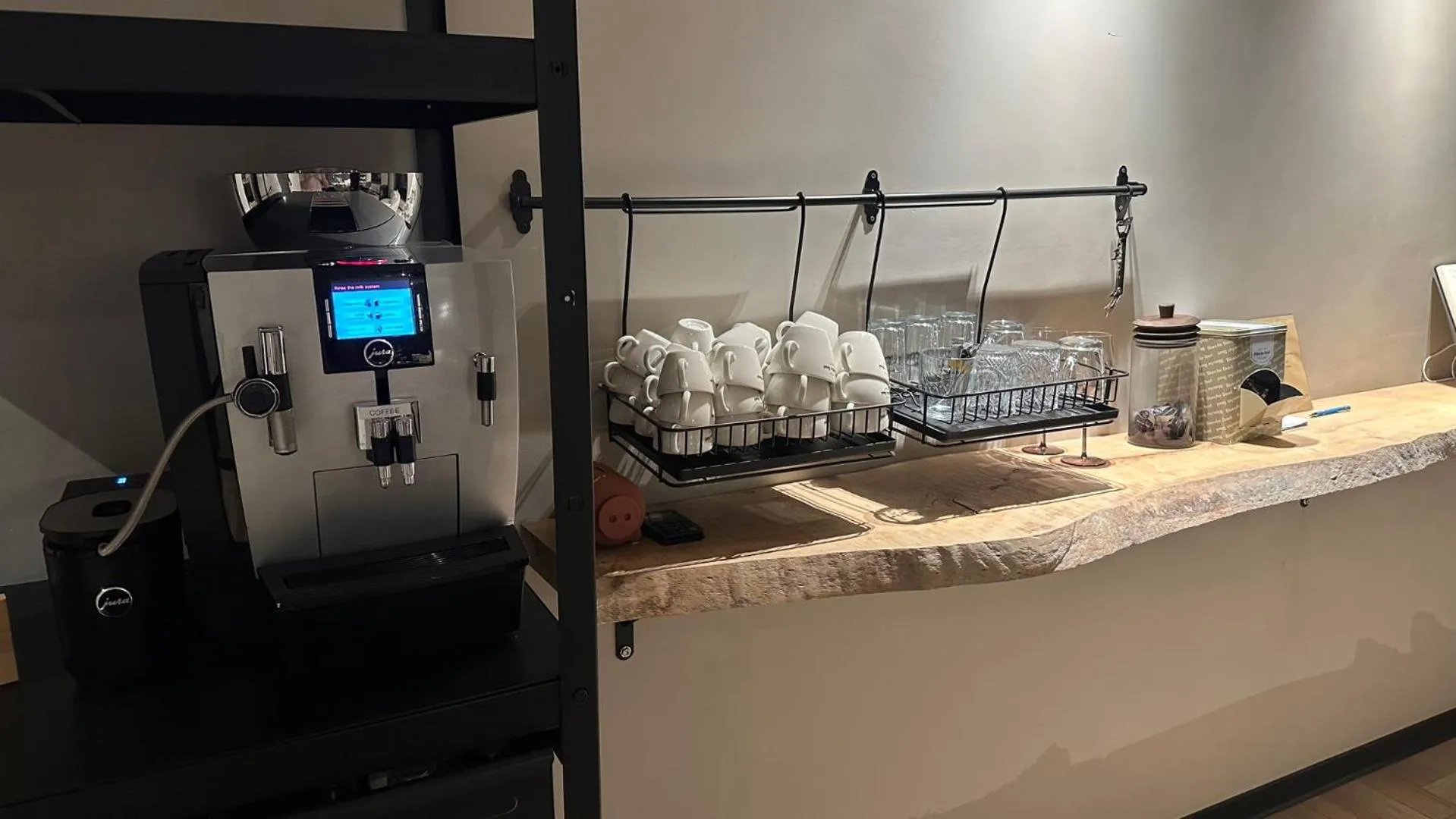 Communal lounge/ TV room in Boutique Hotel Le Faucon