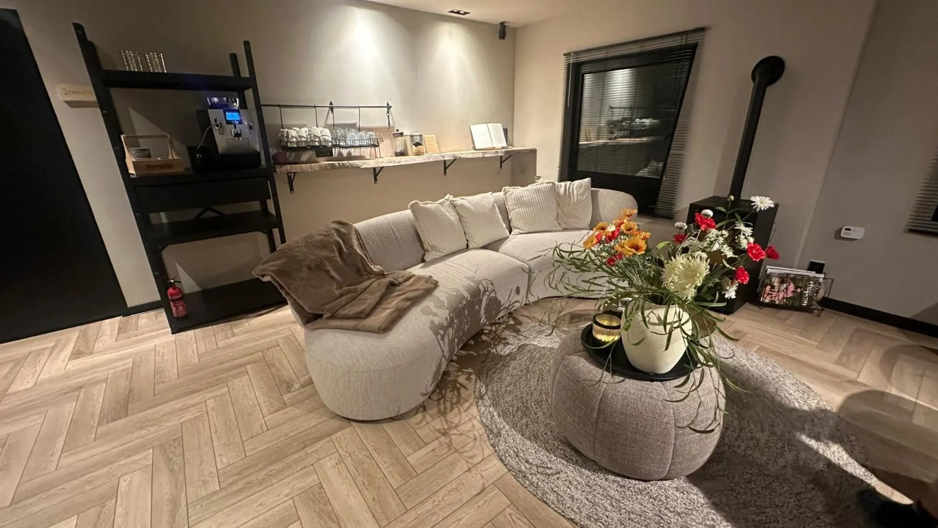 Communal lounge/ TV room in Boutique Hotel Le Faucon