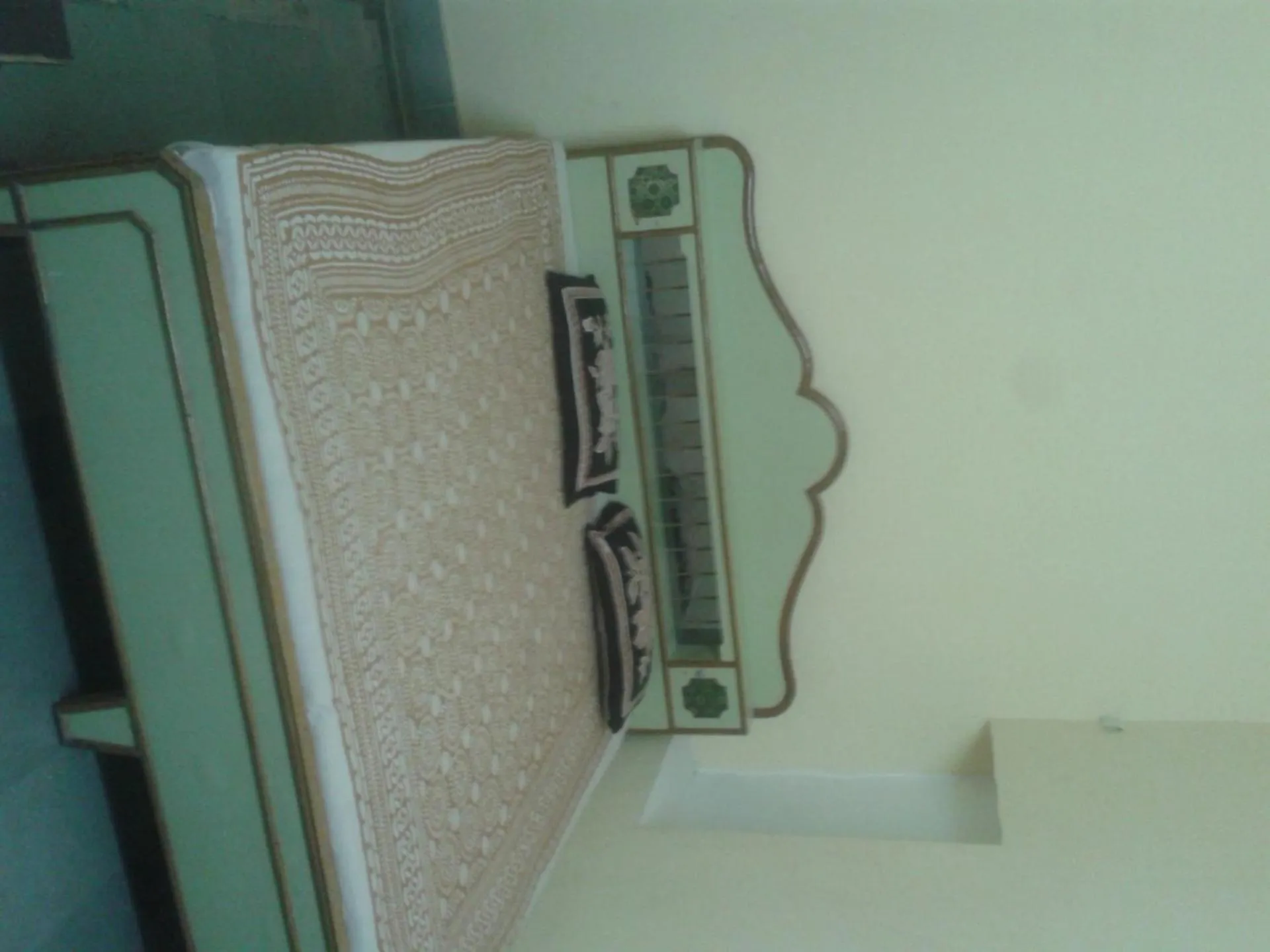 Bed in Raj Mahal Guest House