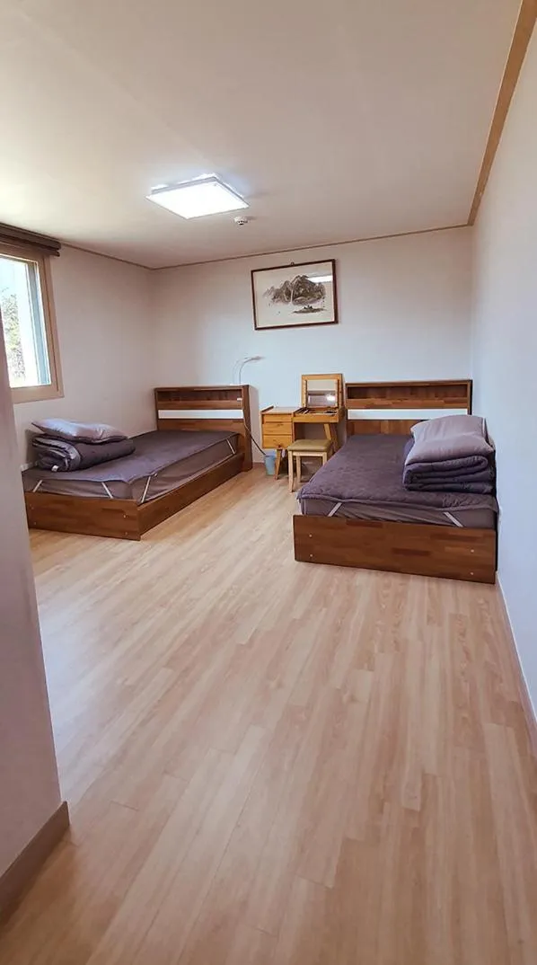 Bed in Gilson Guesthouse