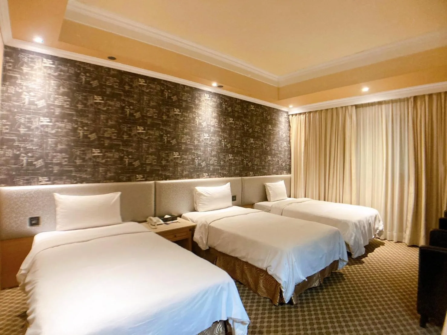 Bed in All Fun Business Hotel