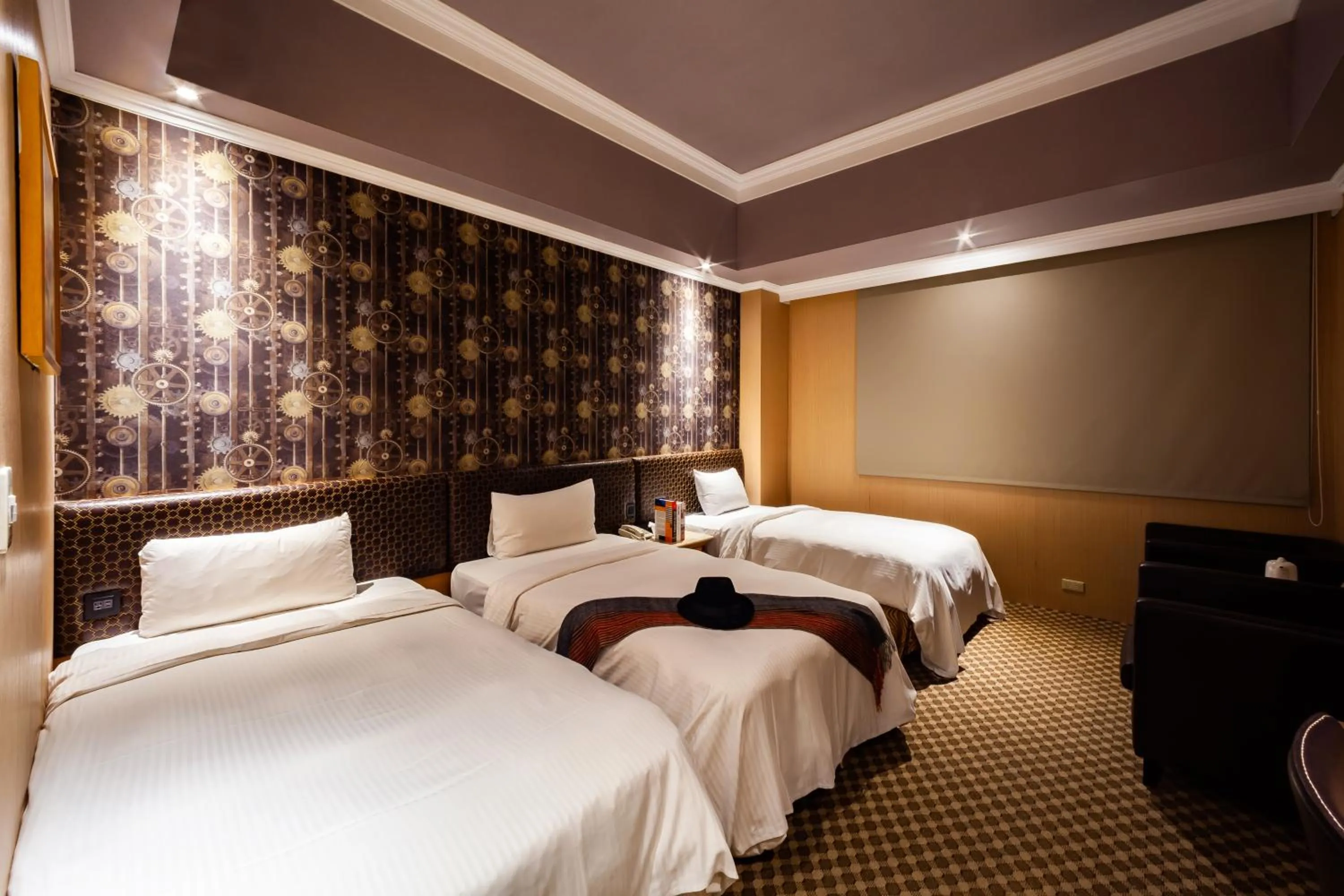 Bed in All Fun Business Hotel