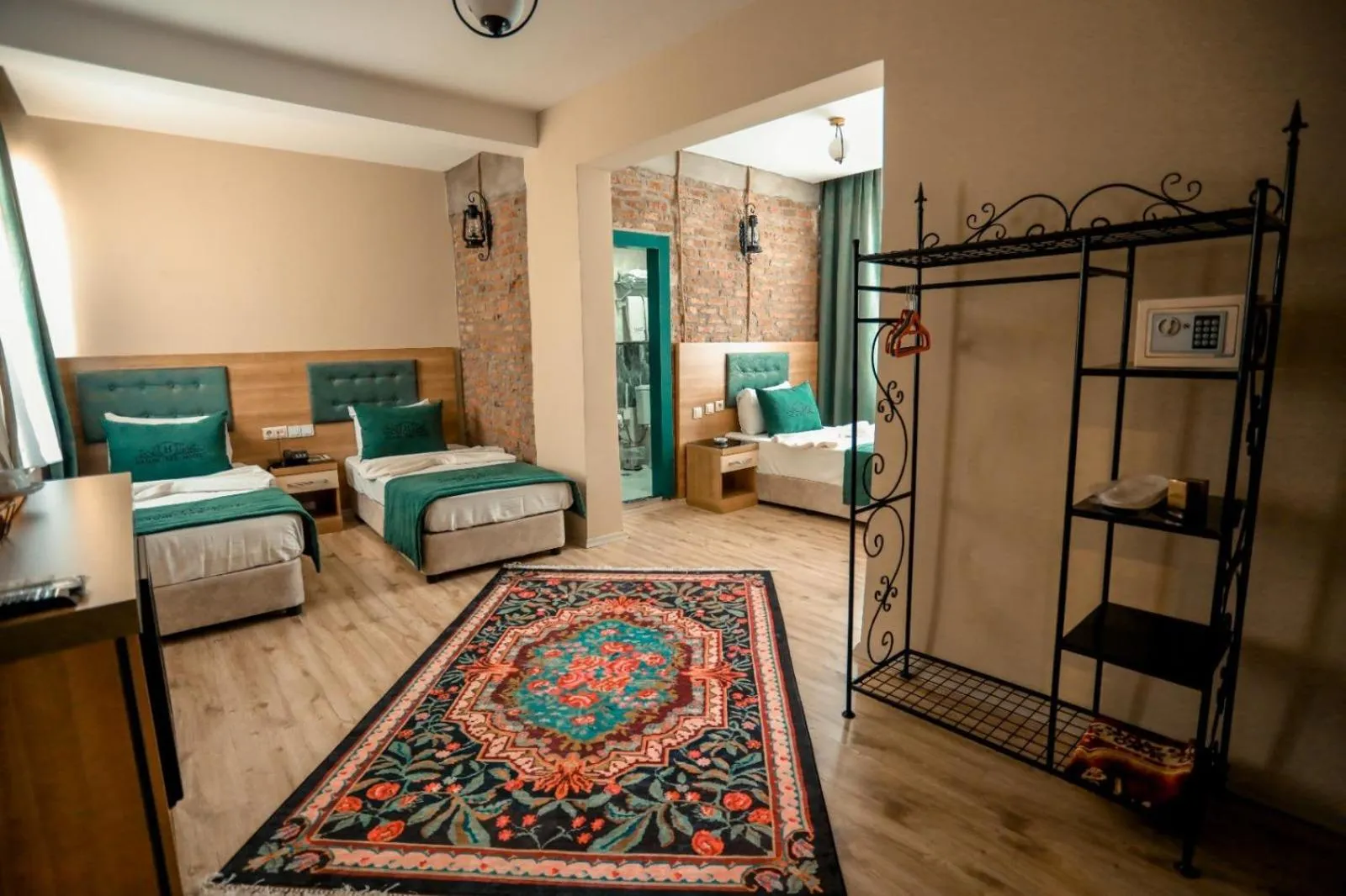 Bed in HASUNİ TAŞ HOTEL