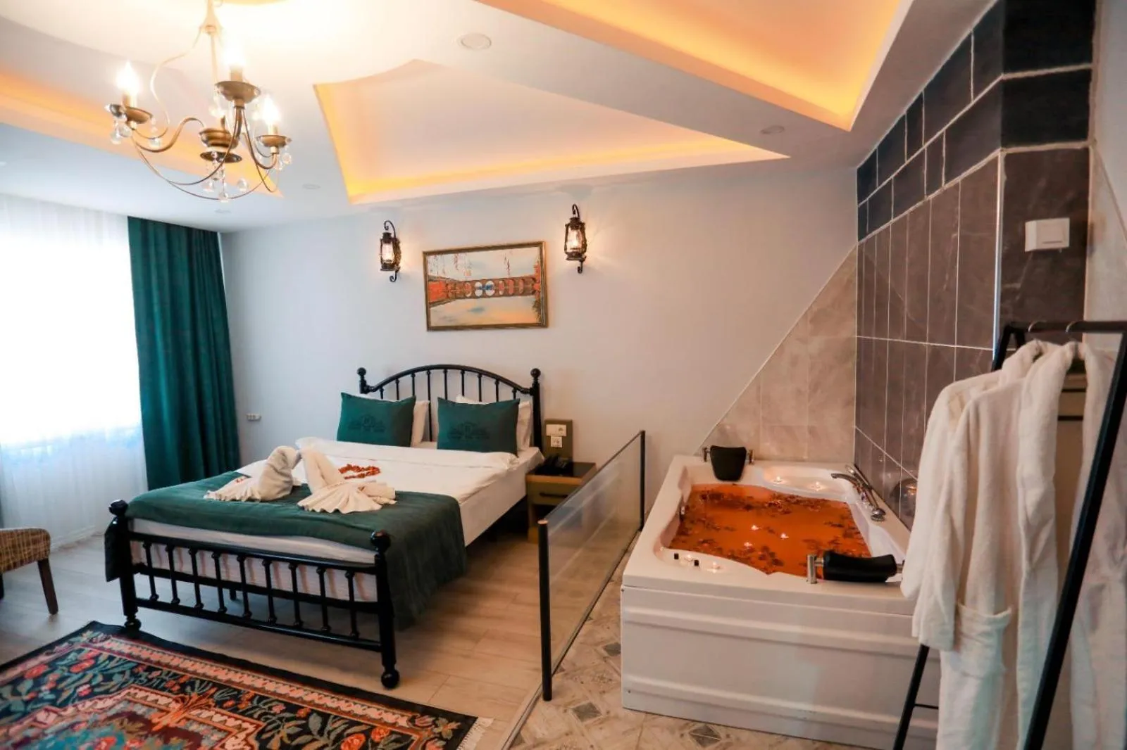 Bed in HASUNİ TAŞ HOTEL