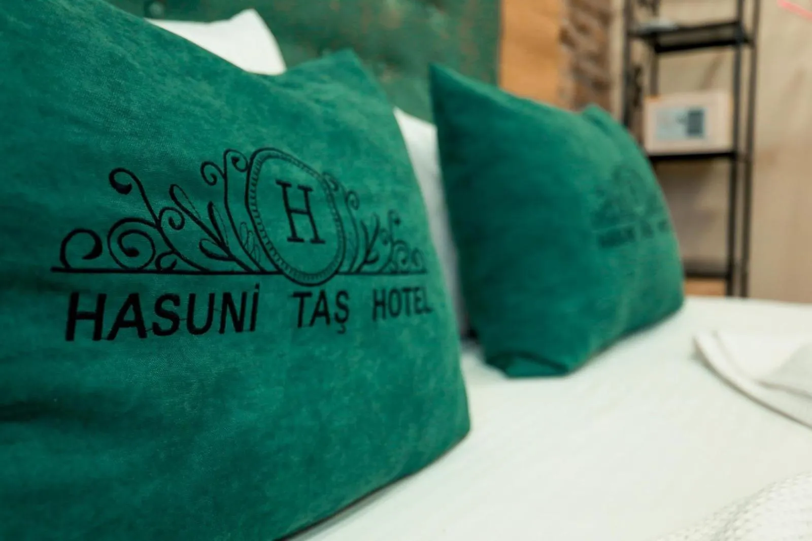 Bed in HASUNİ TAŞ HOTEL