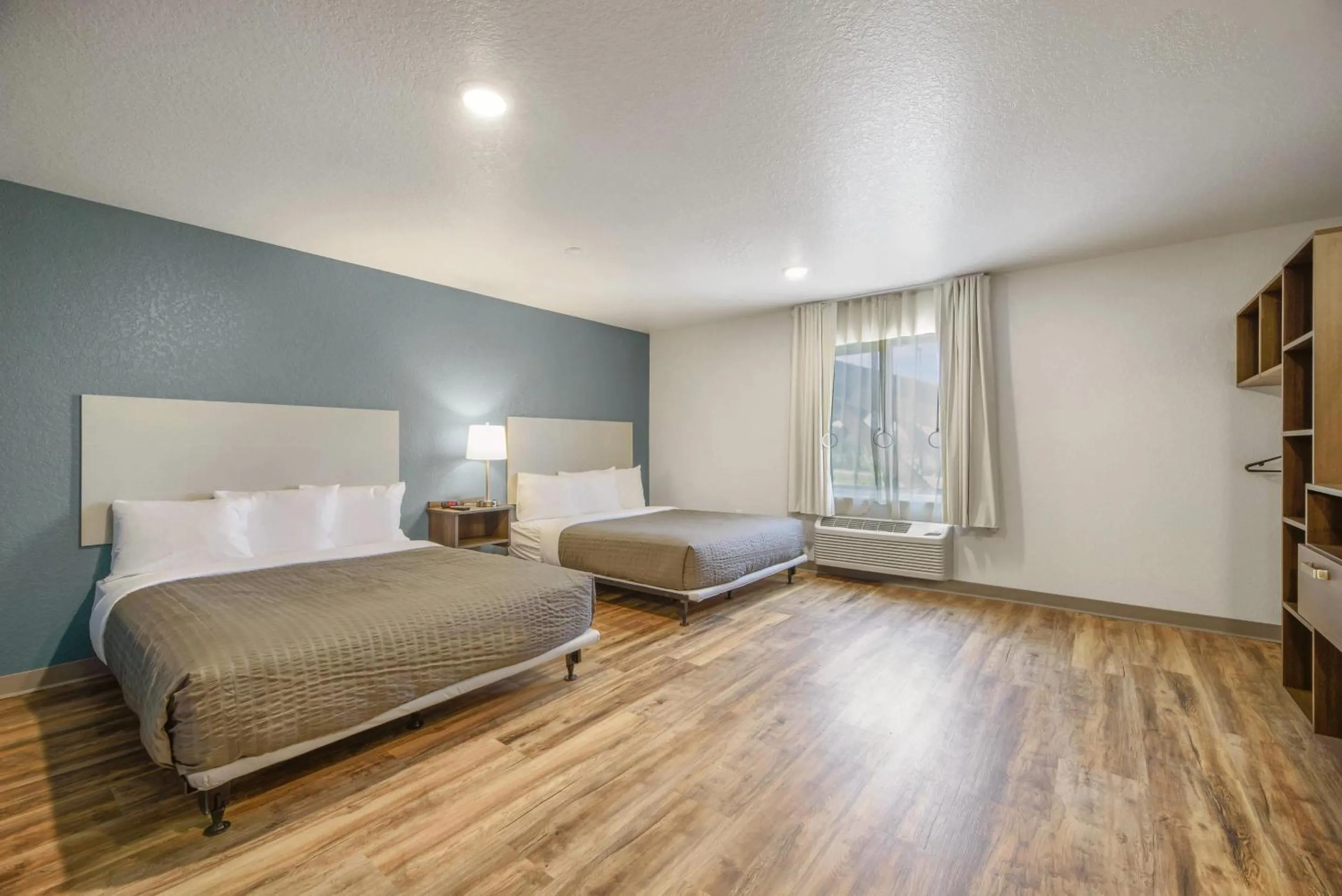 Bedroom, Bed in WoodSpring Suites Orlando I-4 & Convention Center