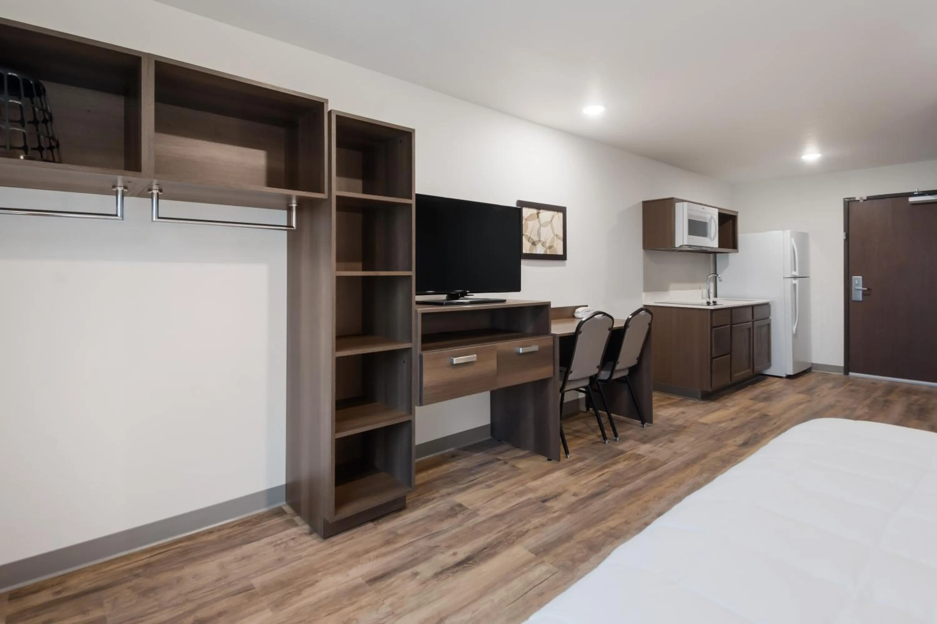 TV and multimedia, Bed in WoodSpring Suites Orlando I-4 & Convention Center