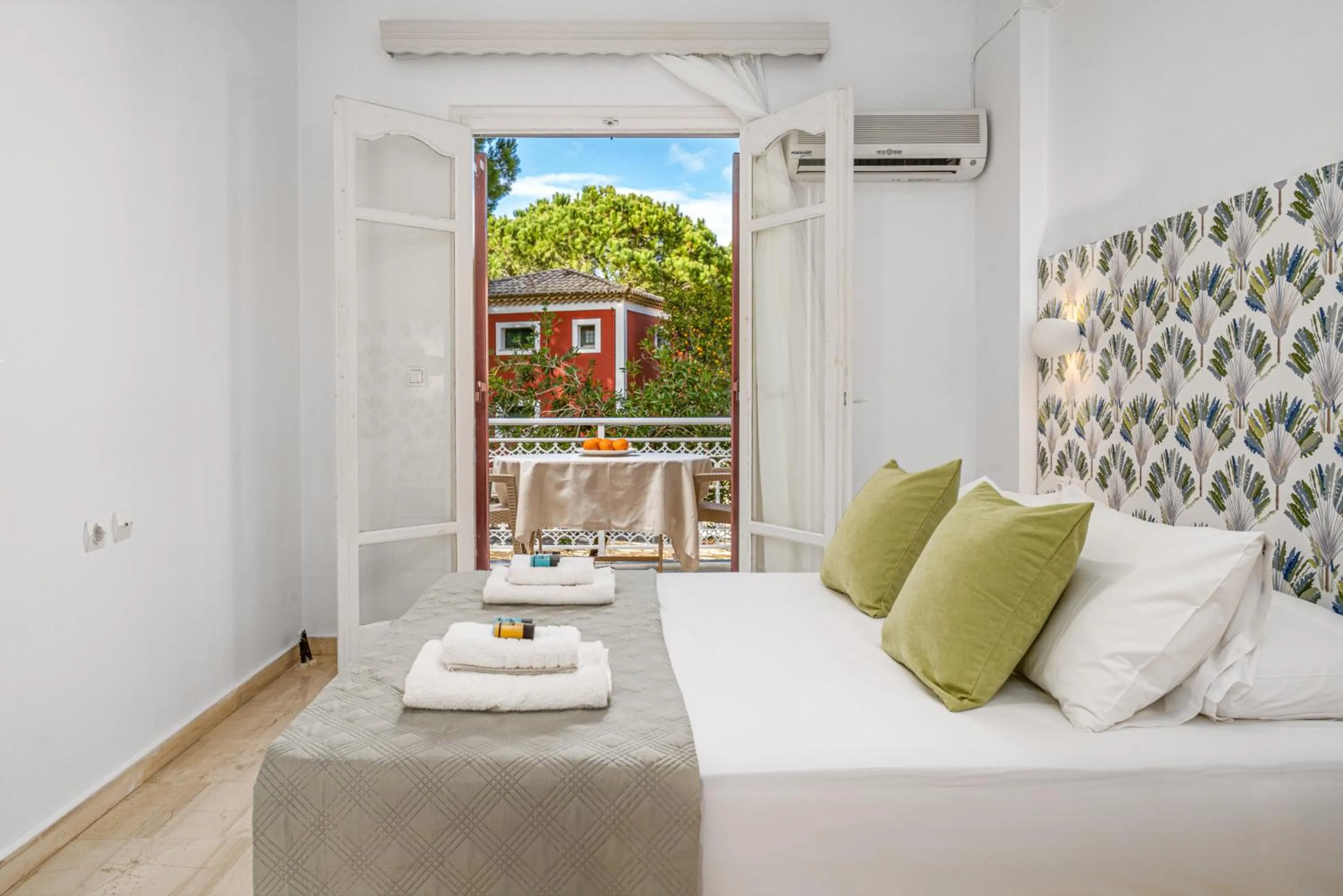 Bed in Pyrgaraki Studios and Apartments