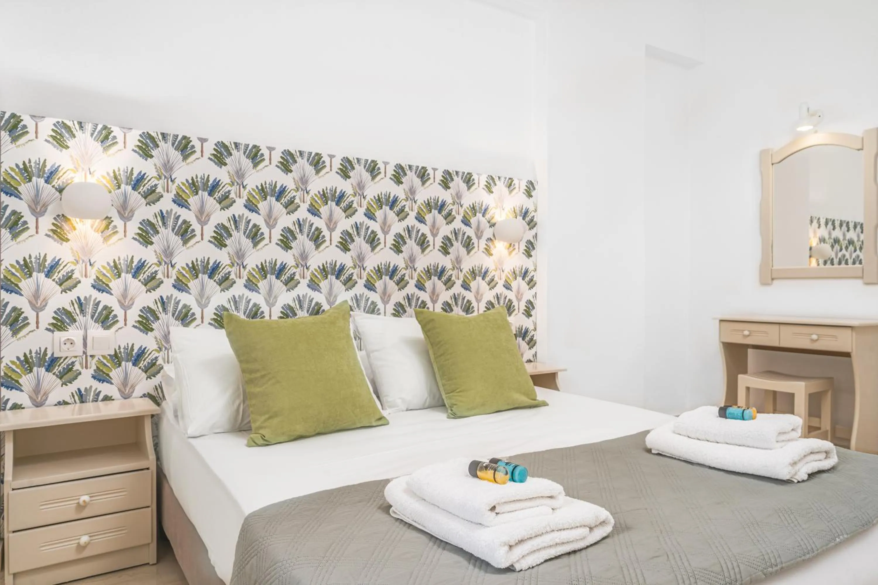 Bed in Pyrgaraki Studios and Apartments