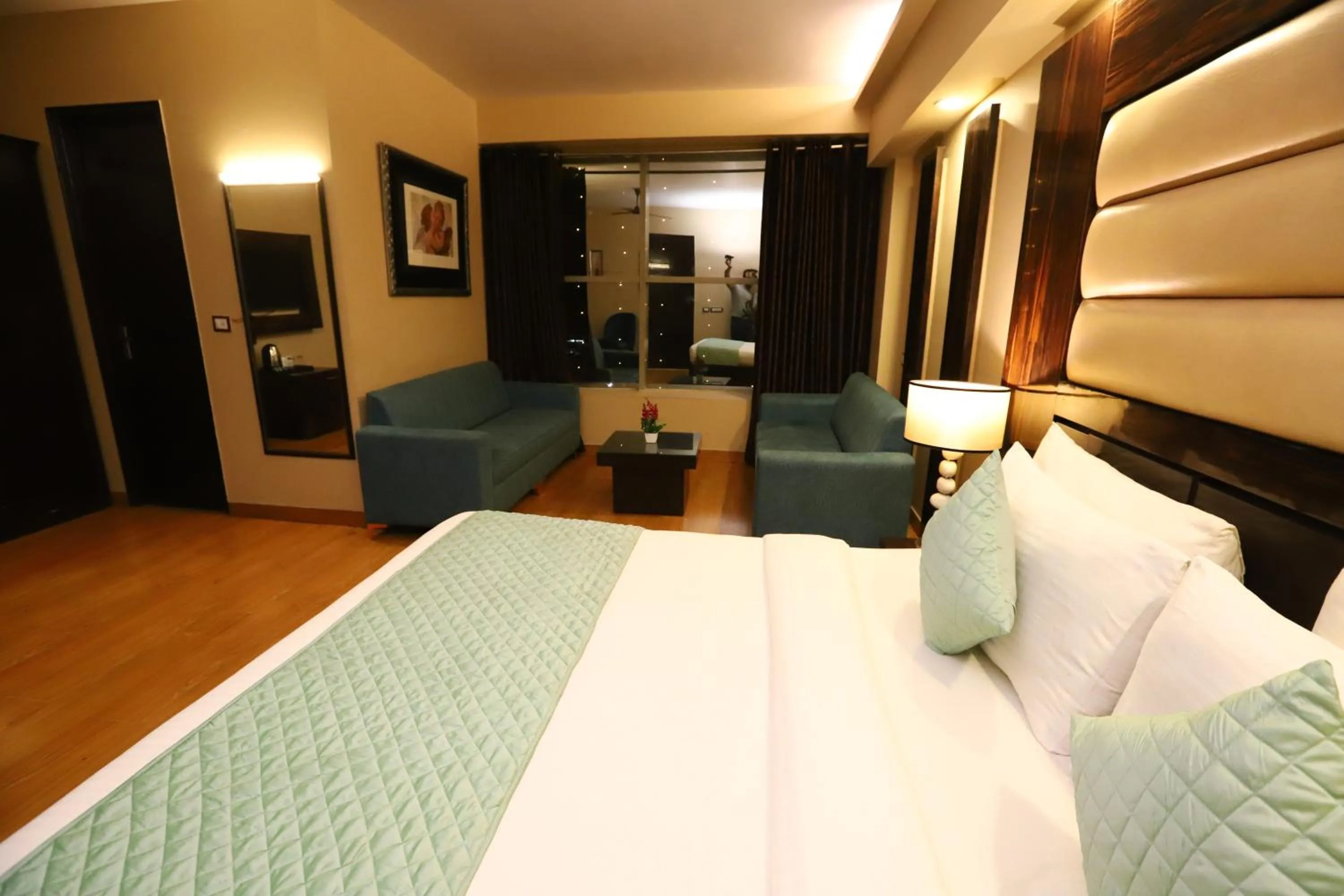 Photo of the whole room, Bed in Hotel Palm Grand Naraina New Delhi - Couple Friendly Local IDs Accepted