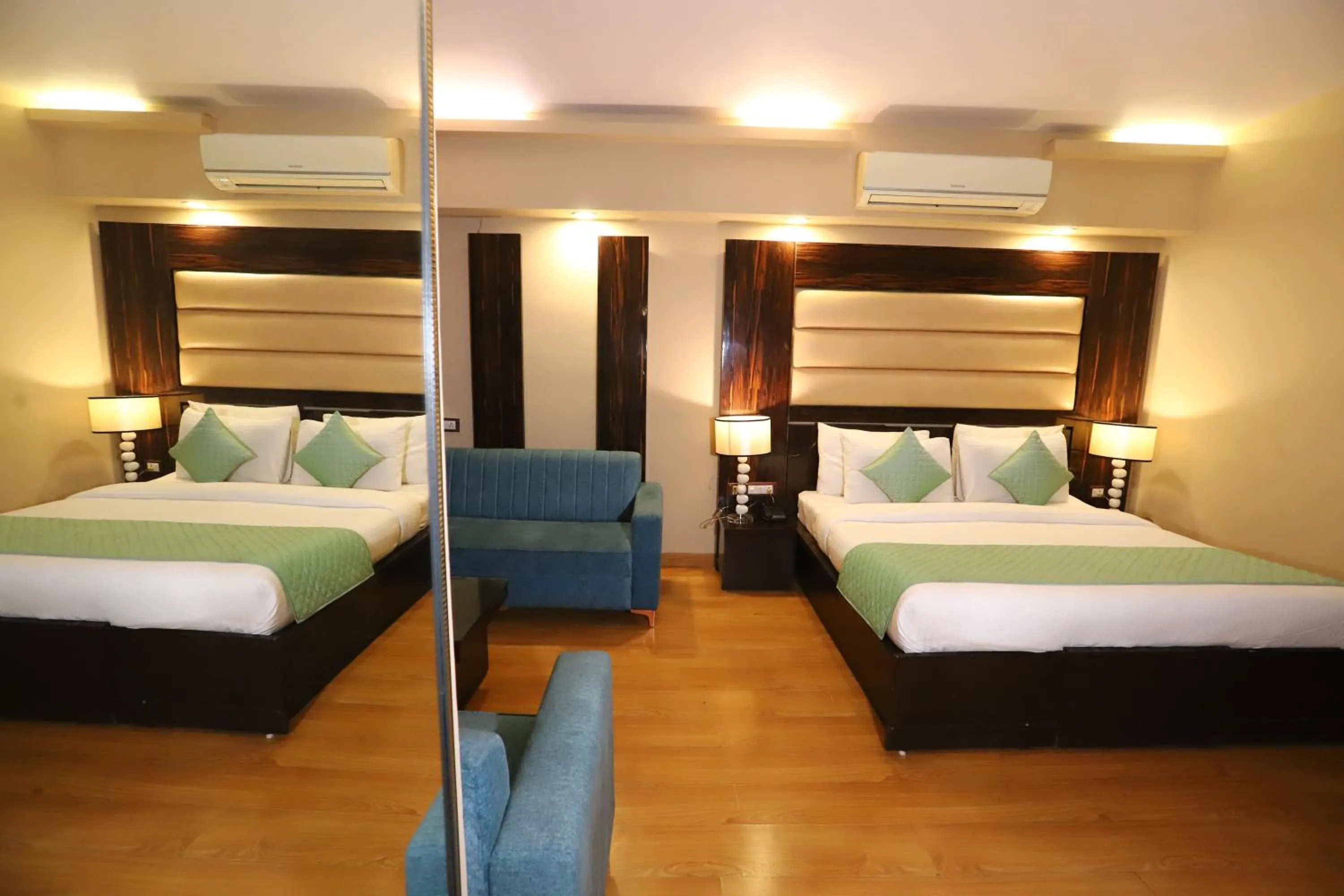 Photo of the whole room, Bed in Hotel Palm Grand Naraina New Delhi - Couple Friendly Local IDs Accepted