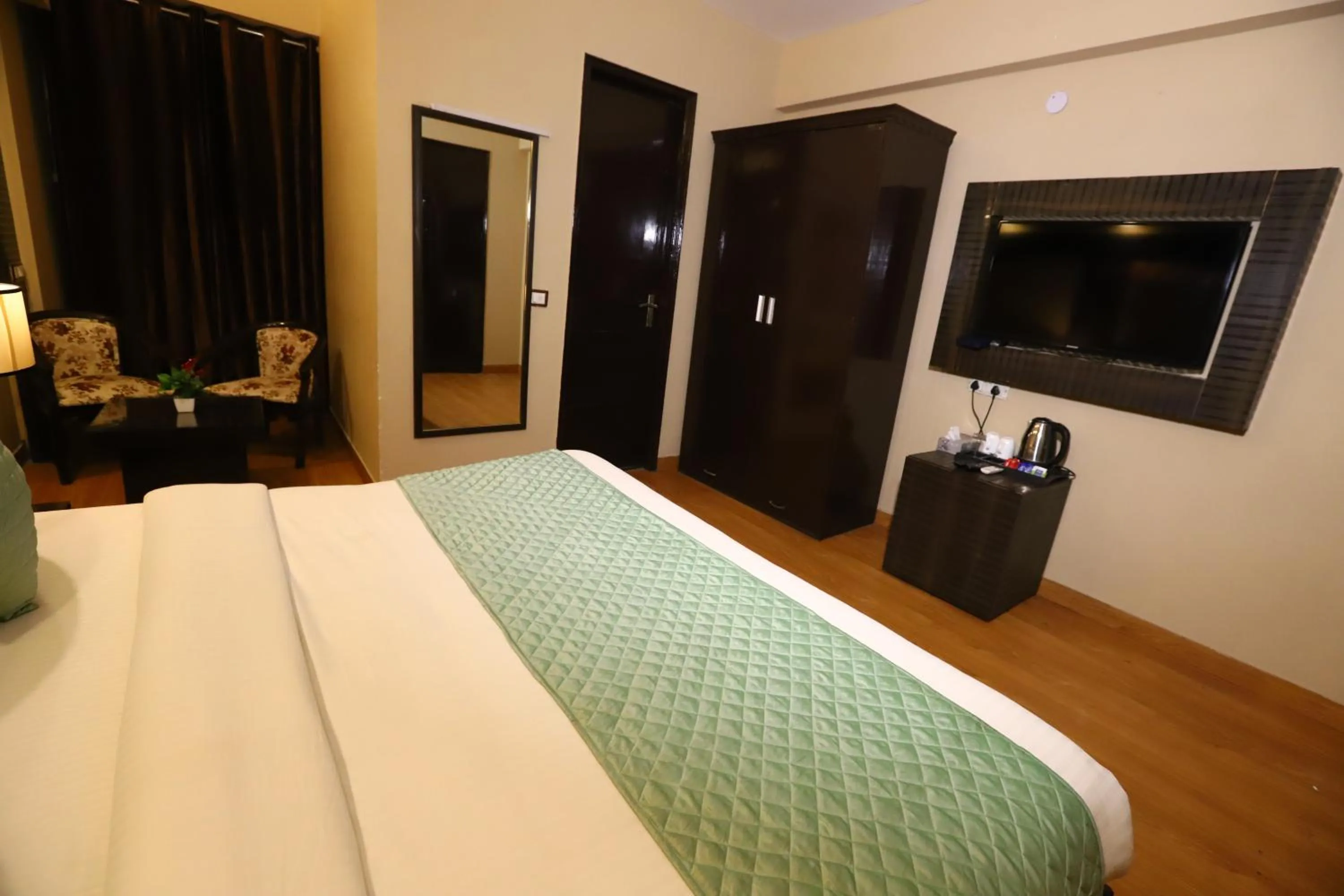 Photo of the whole room, Bed in Hotel Palm Grand Naraina New Delhi - Couple Friendly Local IDs Accepted