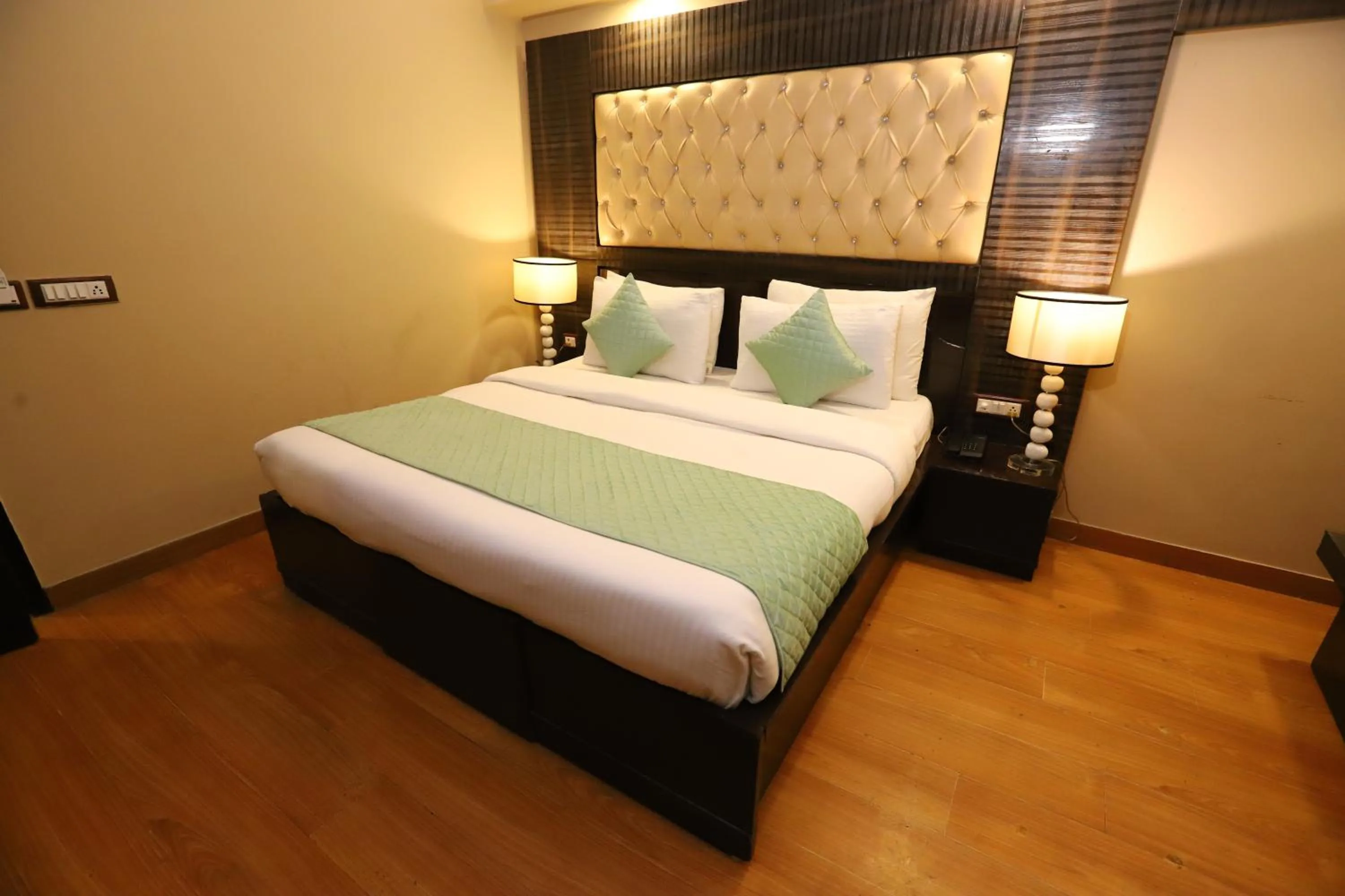 Photo of the whole room, Bed in Hotel Palm Grand Naraina New Delhi - Couple Friendly Local IDs Accepted