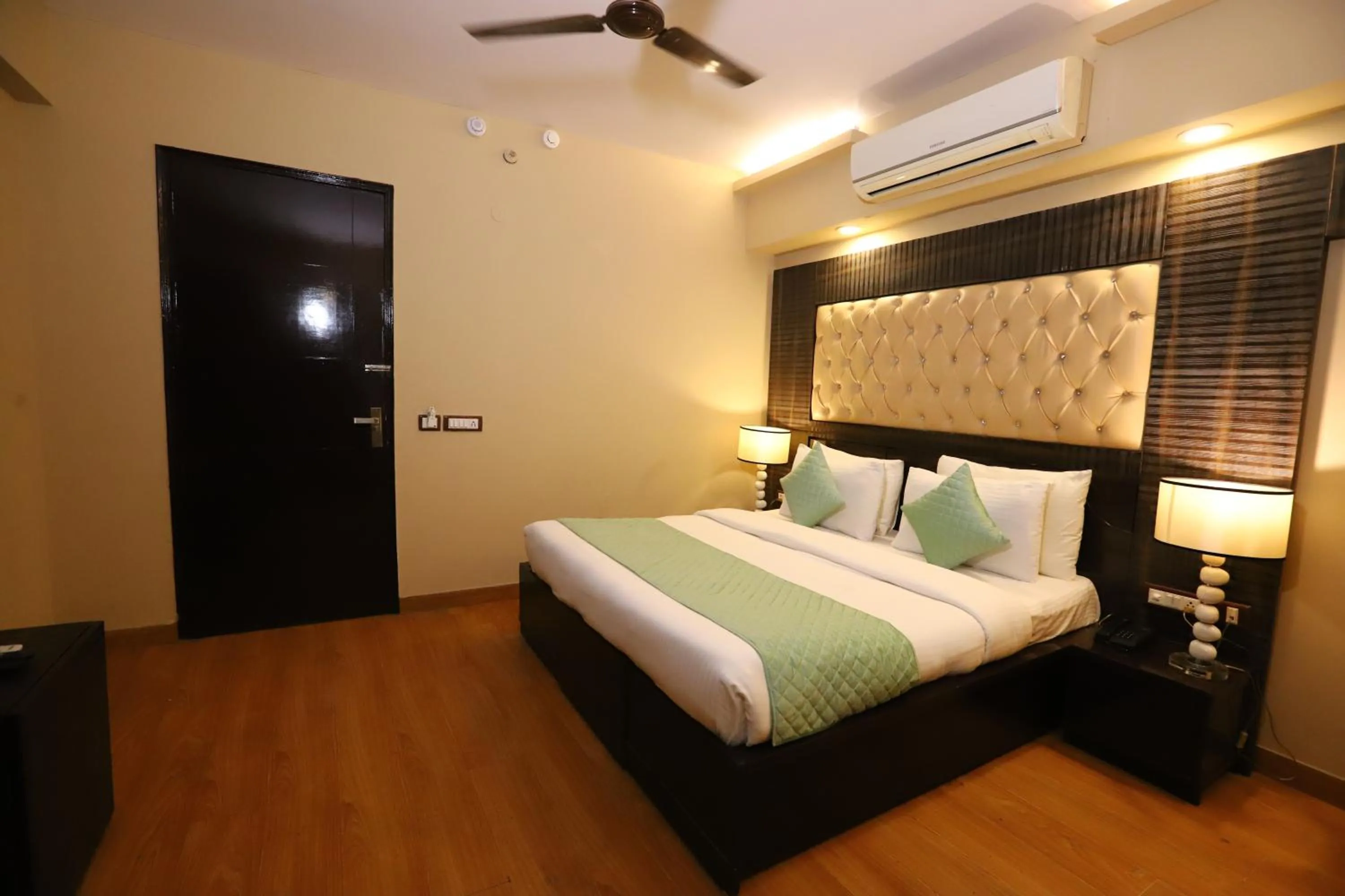 Photo of the whole room, Bed in Hotel Palm Grand Naraina New Delhi - Couple Friendly Local IDs Accepted