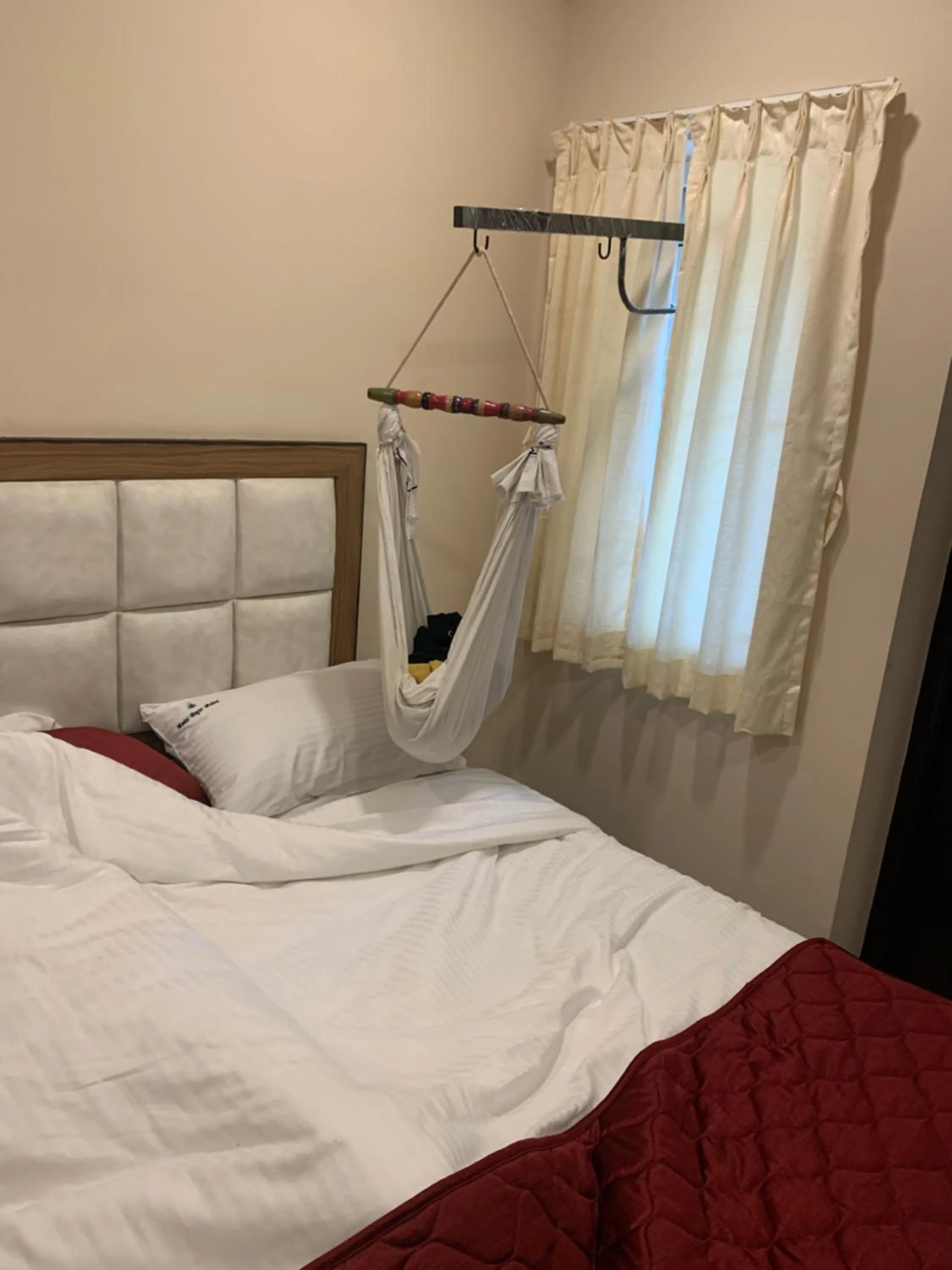 Bed in Bogar Palace Kodaikanal