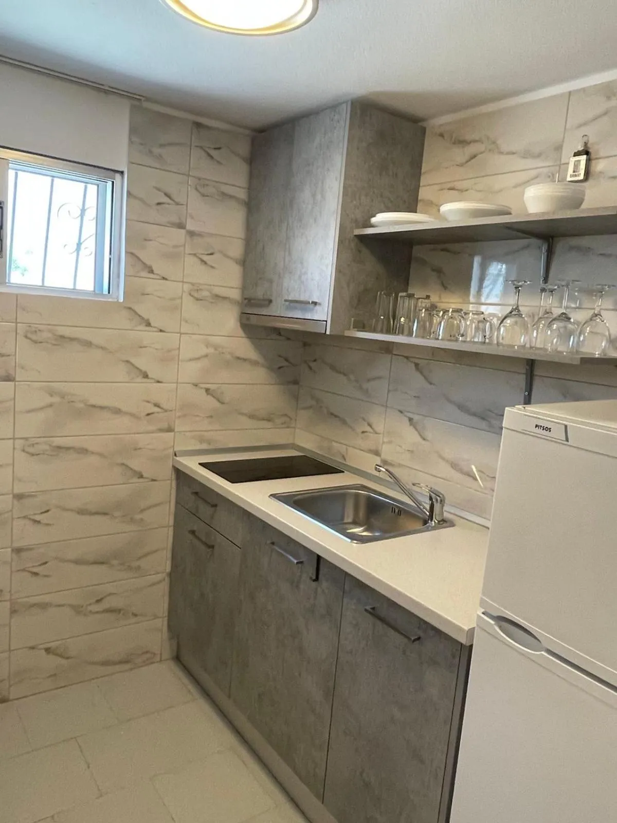 kitchen in Garden View Apartments by nikolis
