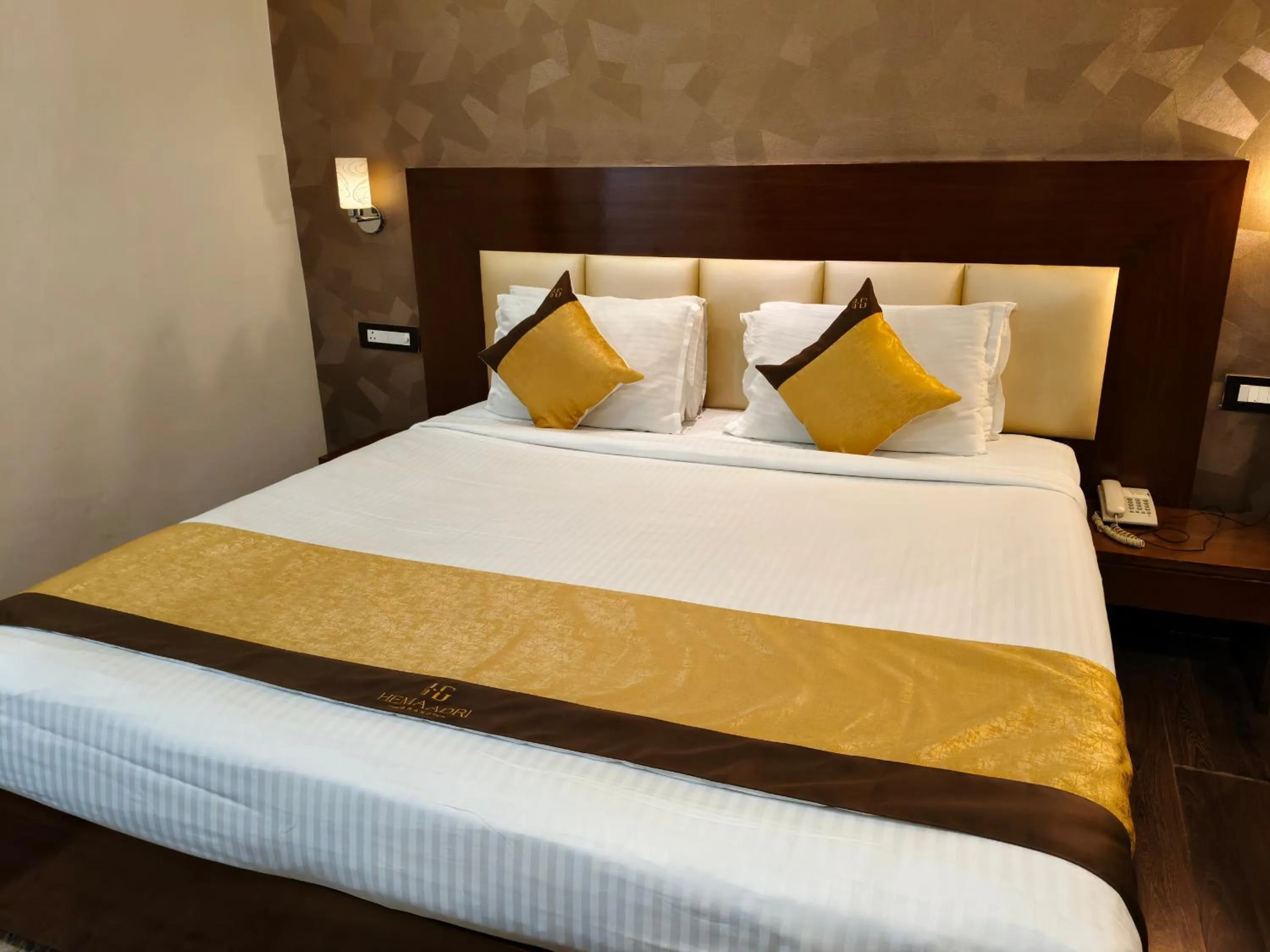 Bed in Hemaadri Grand