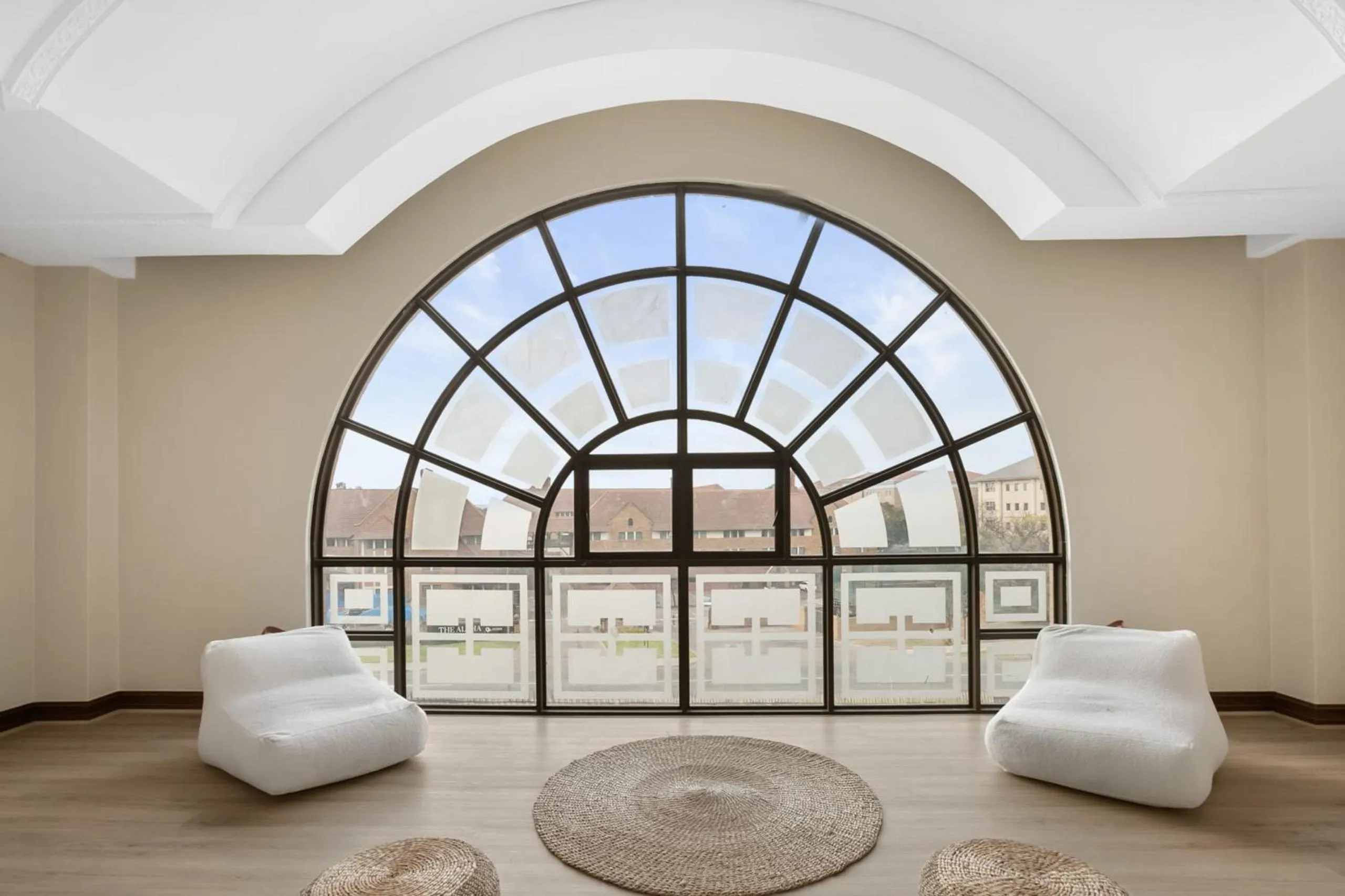 Communal lounge/ TV room in The Archer Aparthotel by Totalstay