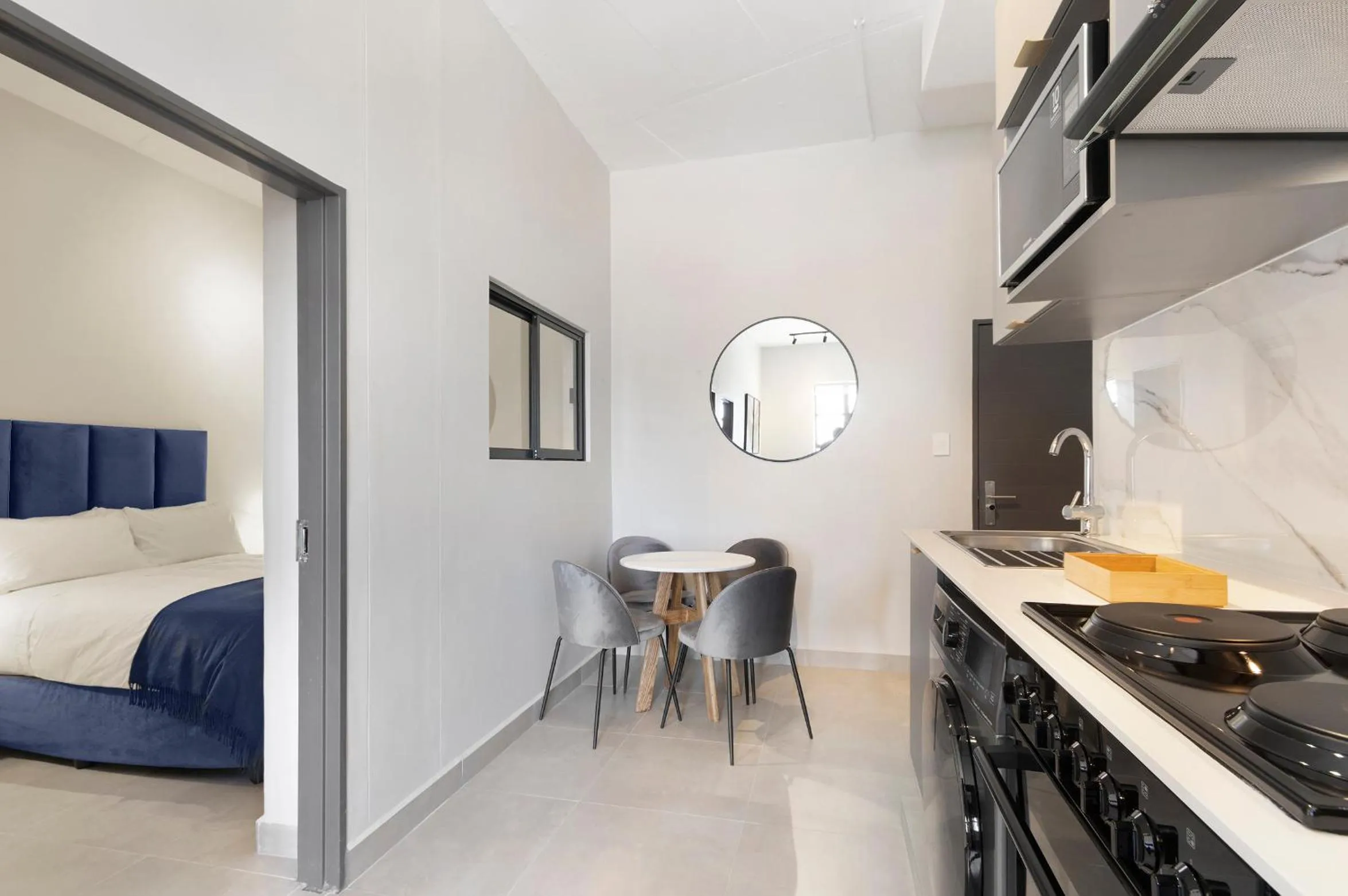 Kitchen or kitchenette in The Archer Aparthotel by Totalstay