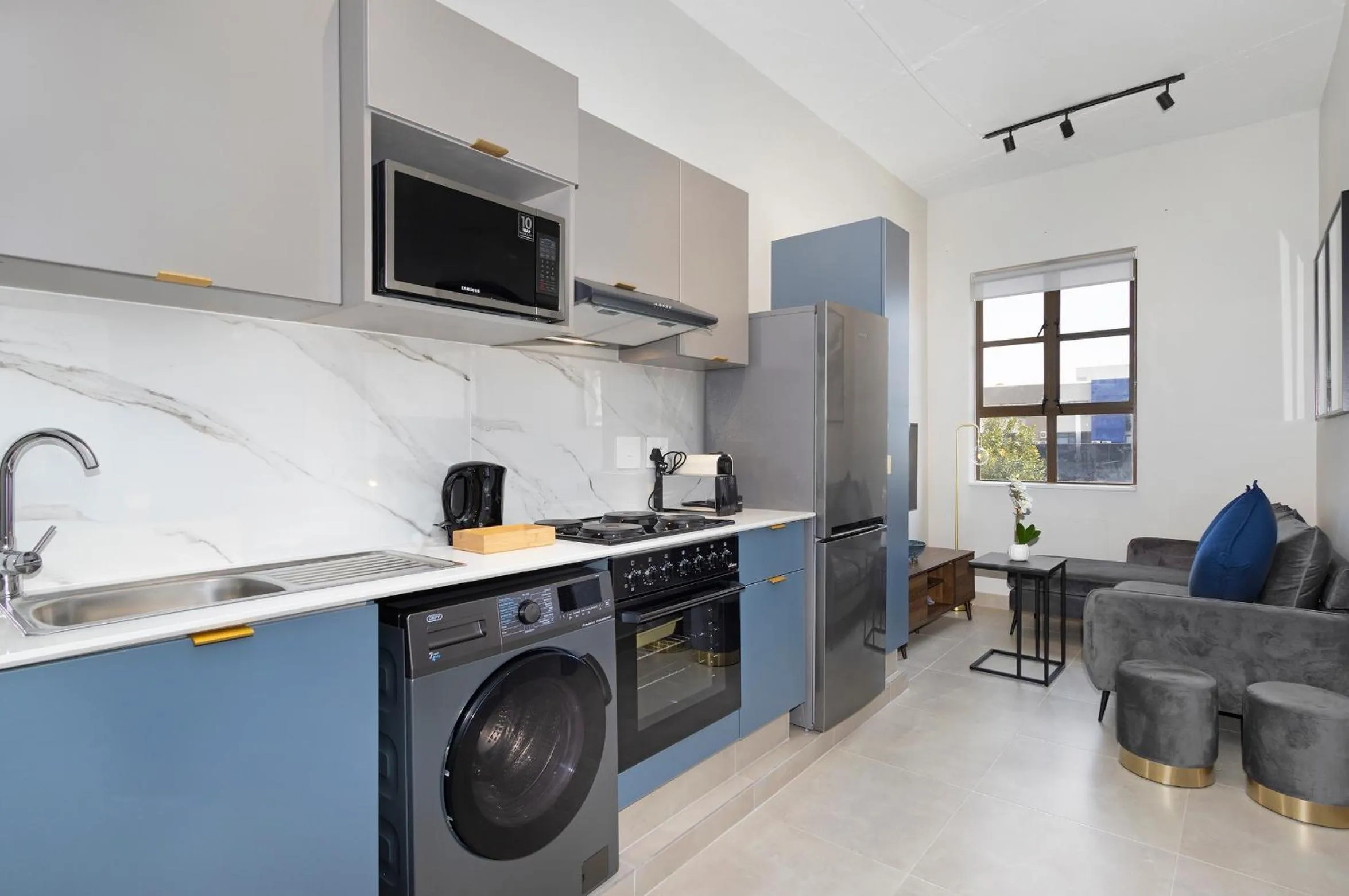 Kitchen or kitchenette in The Archer Aparthotel by Totalstay