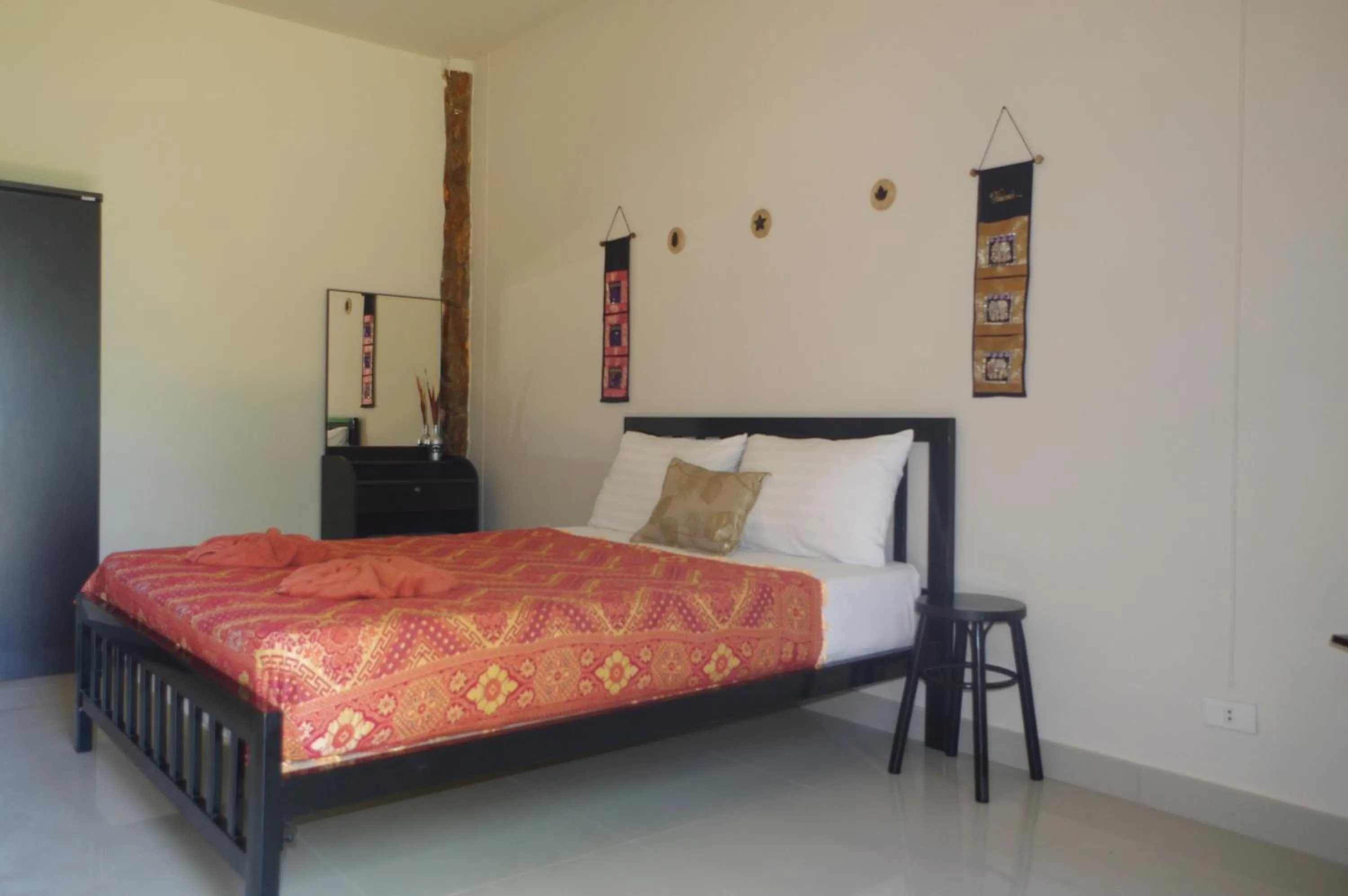 Bed in Thai House Beach Resort