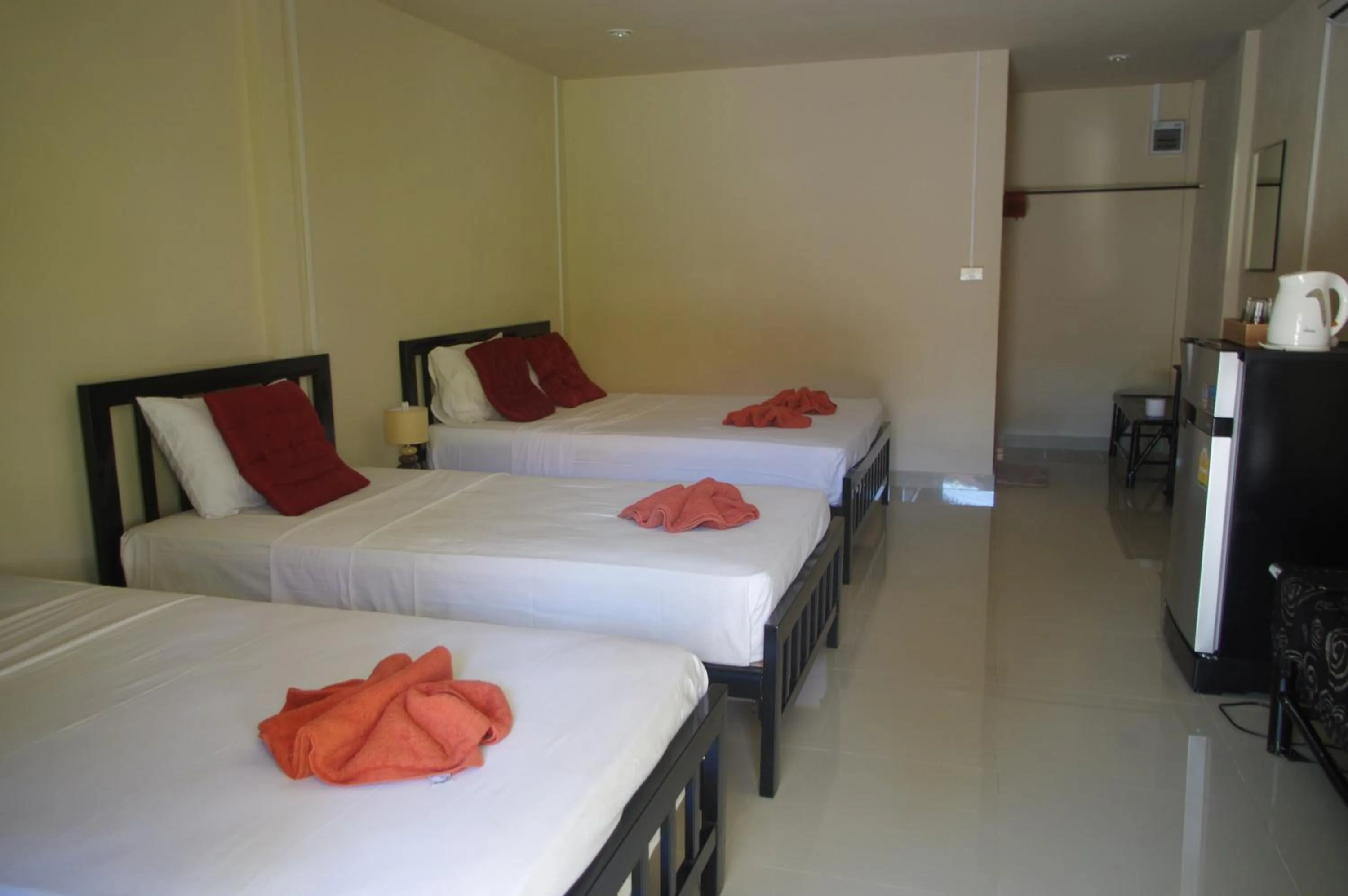 Bed in Thai House Beach Resort