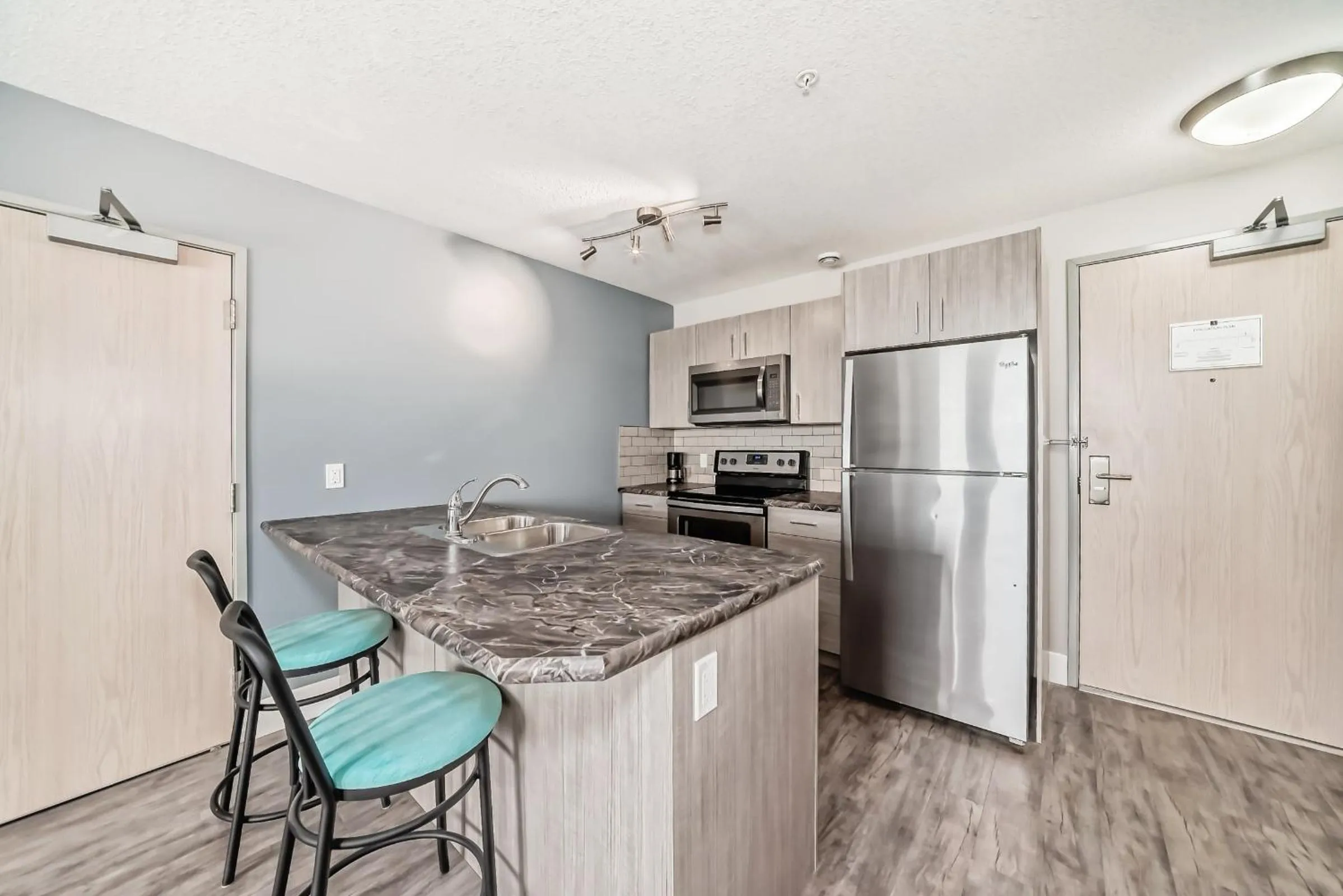 kitchen in The Suites, INN Hotels
