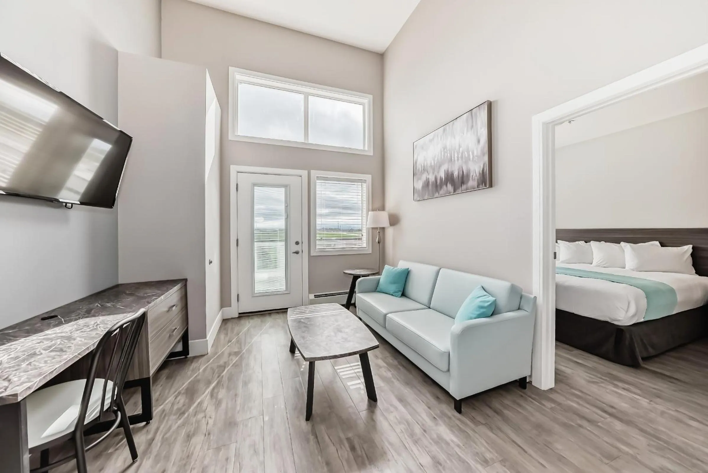 Living room in The Suites, INN Hotels