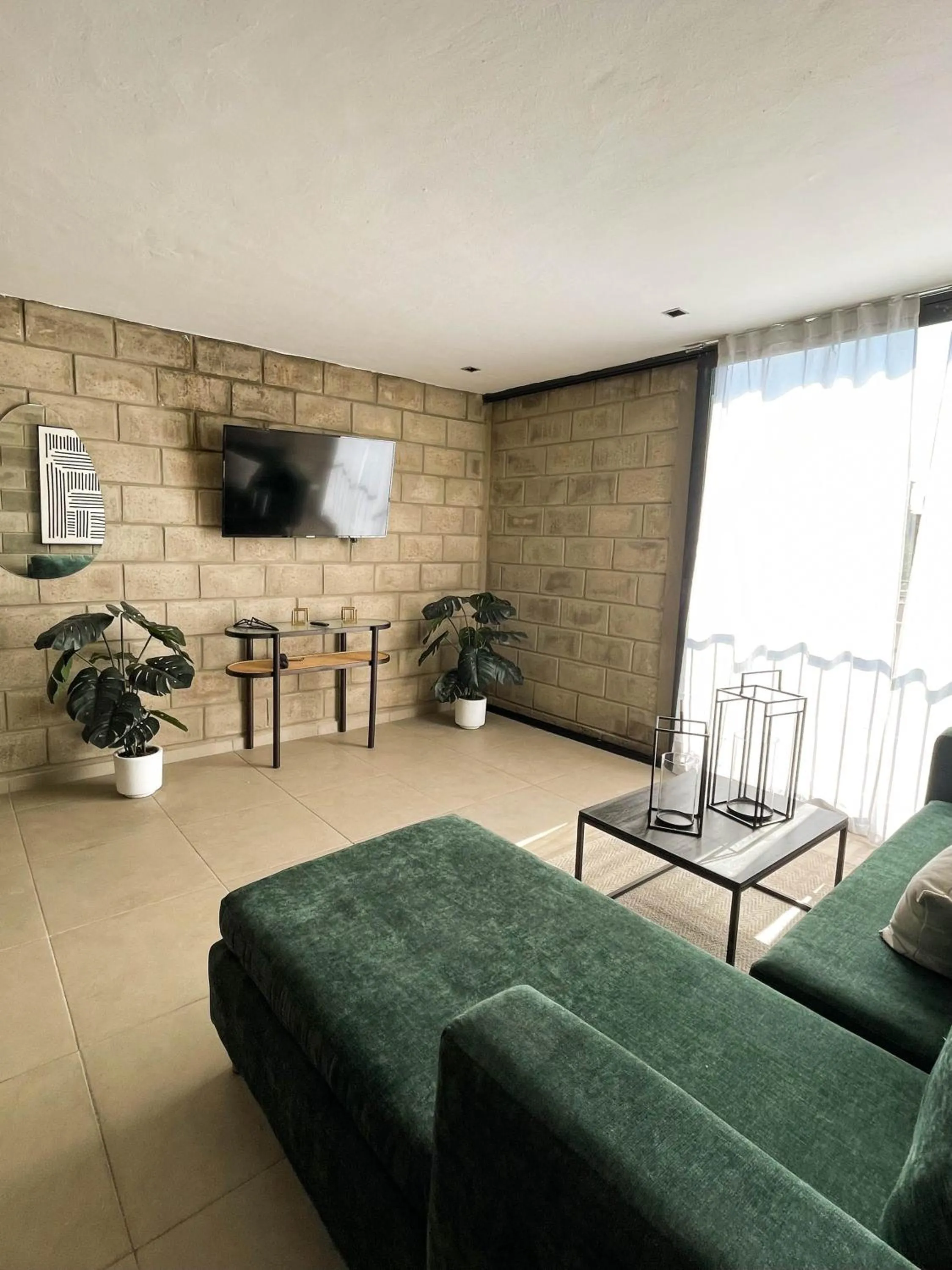 Communal lounge/ TV room in Tribu Centro Histórico