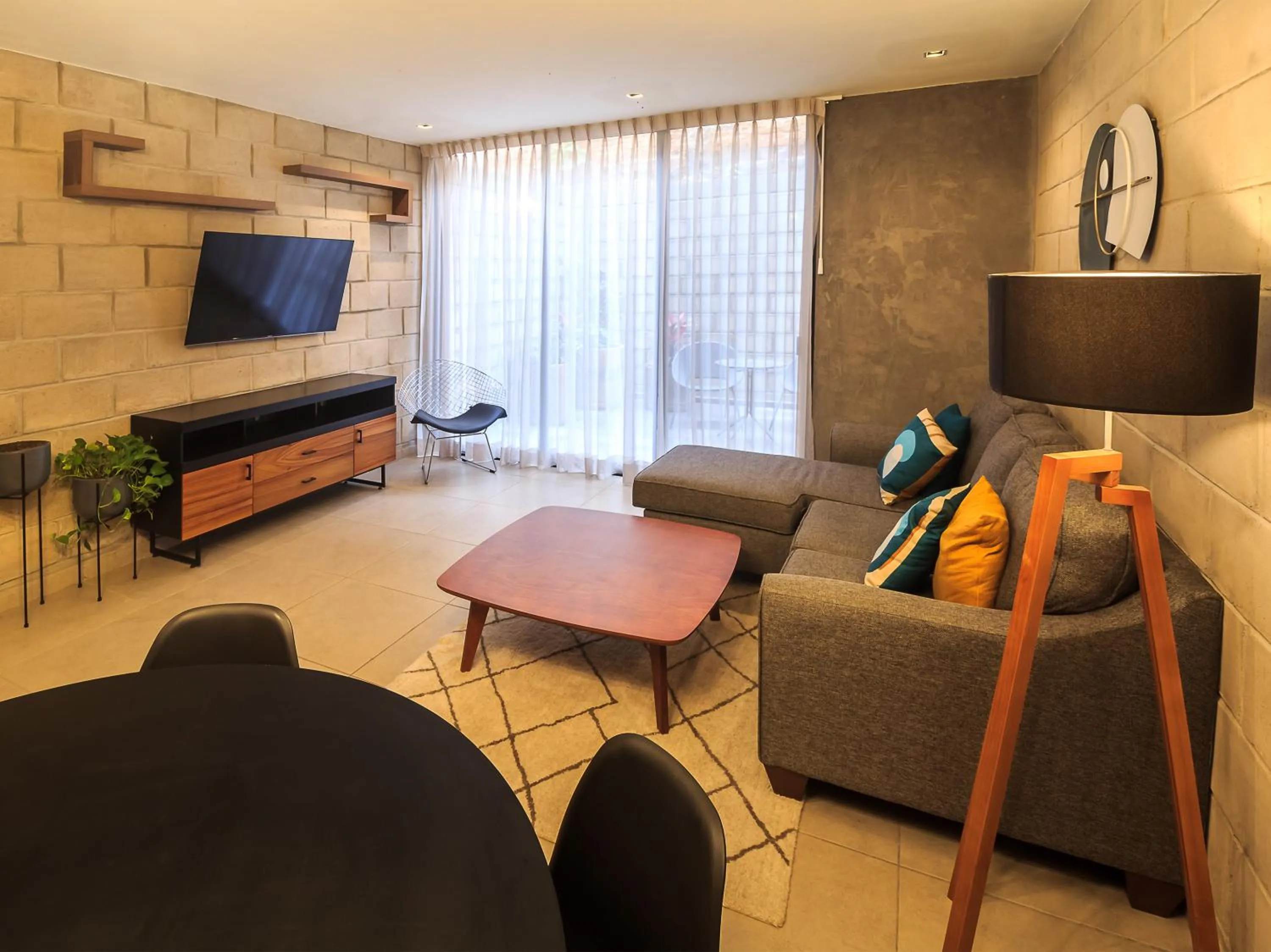 Communal lounge/ TV room in Tribu Centro Histórico